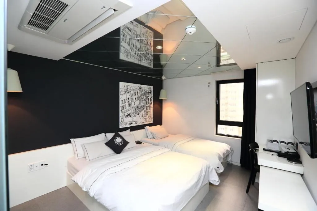 Bed in Jeju Cullinan Hotel