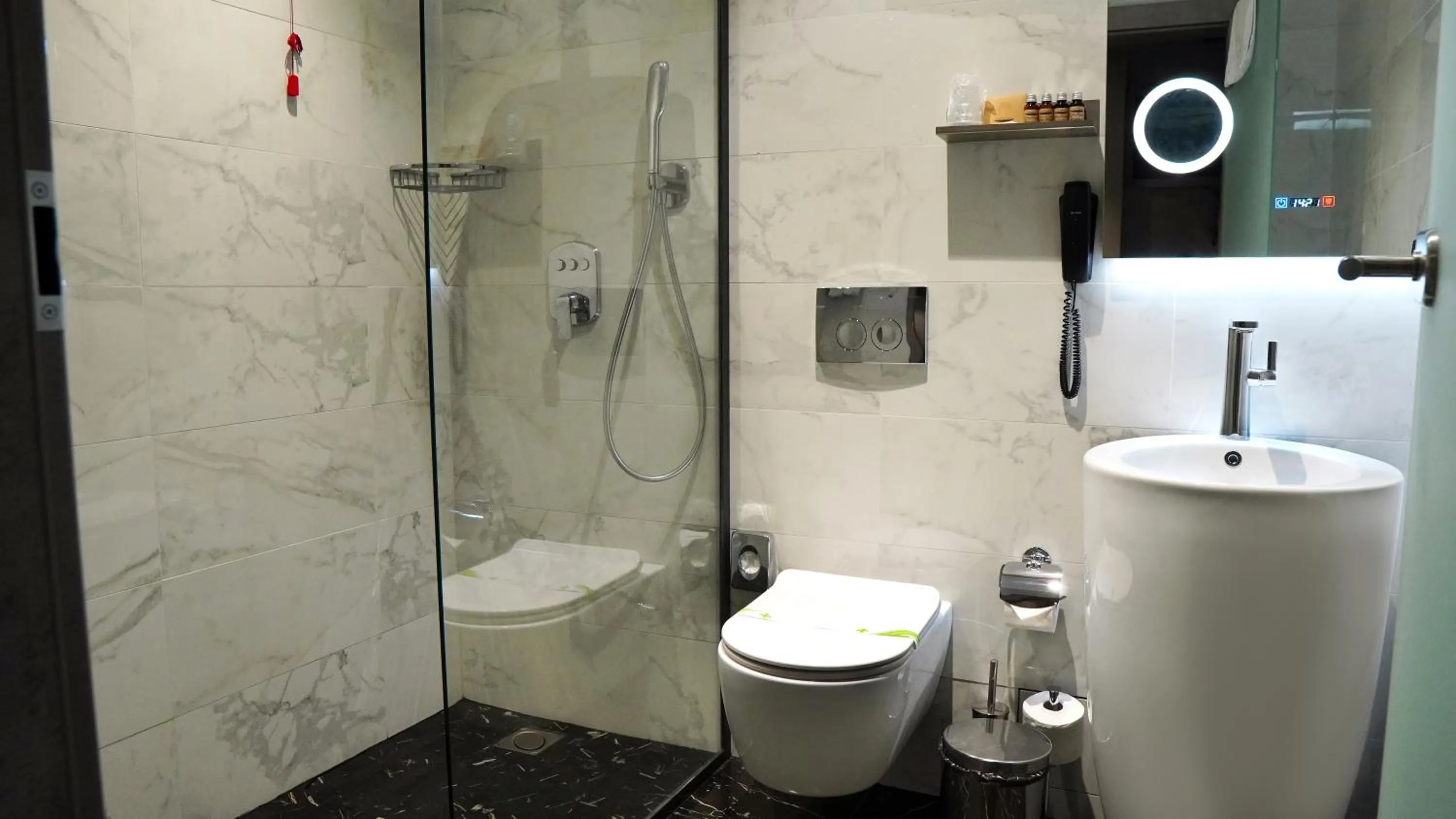 Shower in Aniroc Signature Hotel