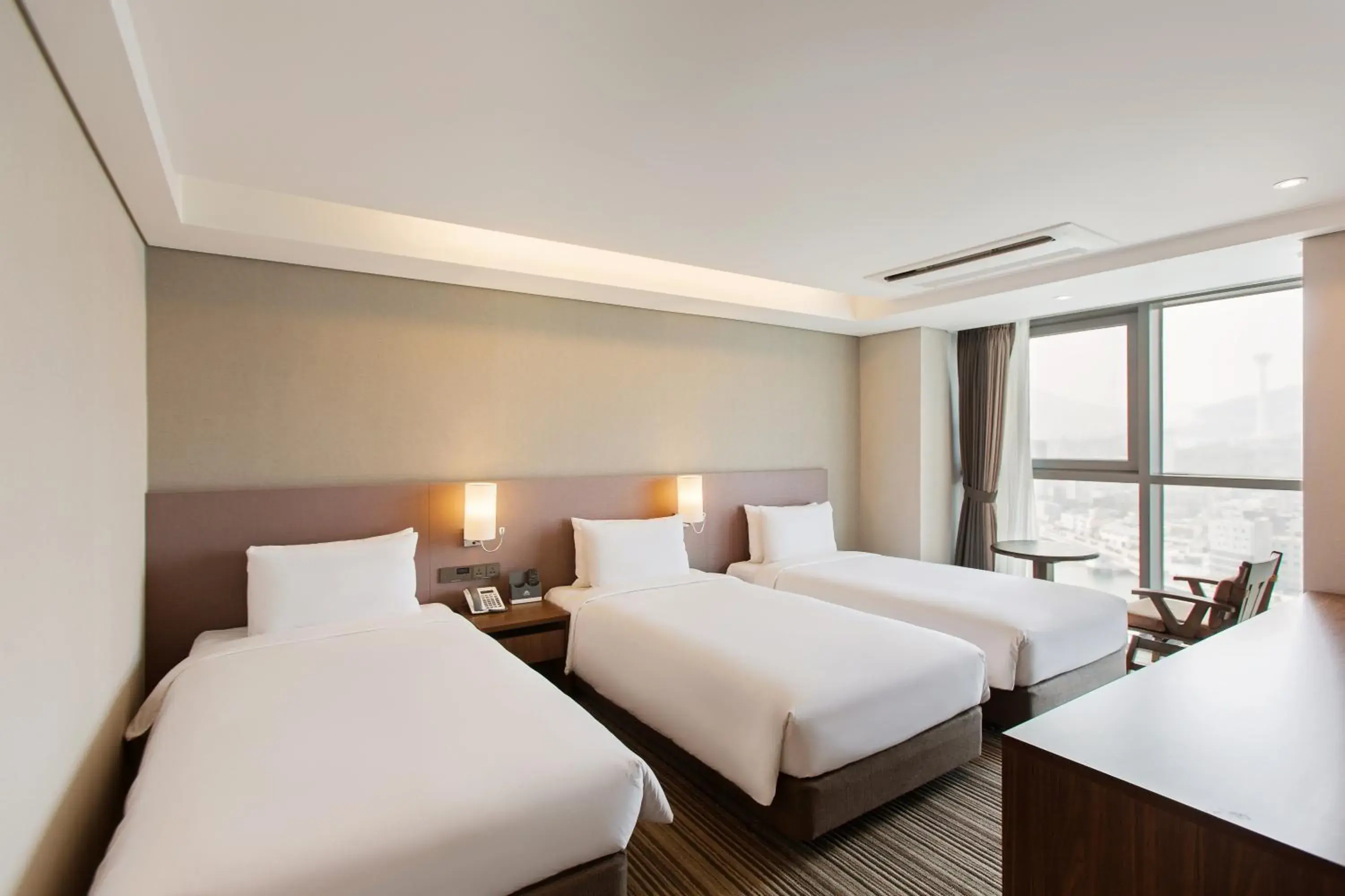 Deluxe Triple Room with Partial Ocean View in Hotel Adela Deluxe Triple Room with Partial Ocean View in Hotel Adela