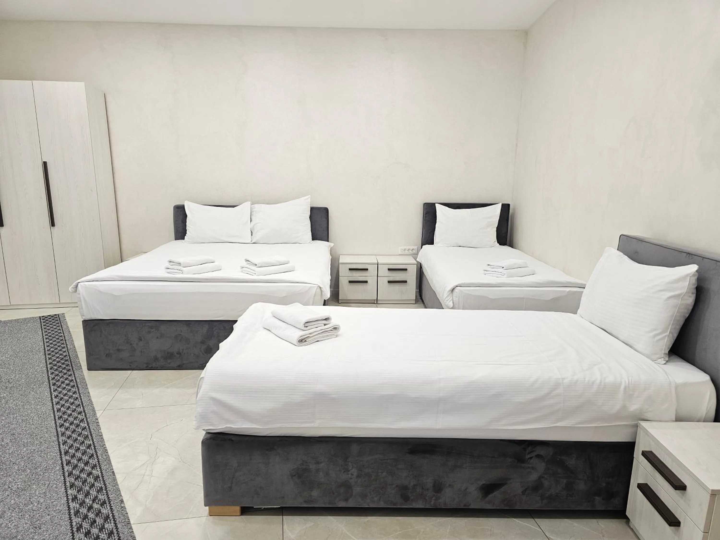 Bed in Ornament Hotel and Apartments