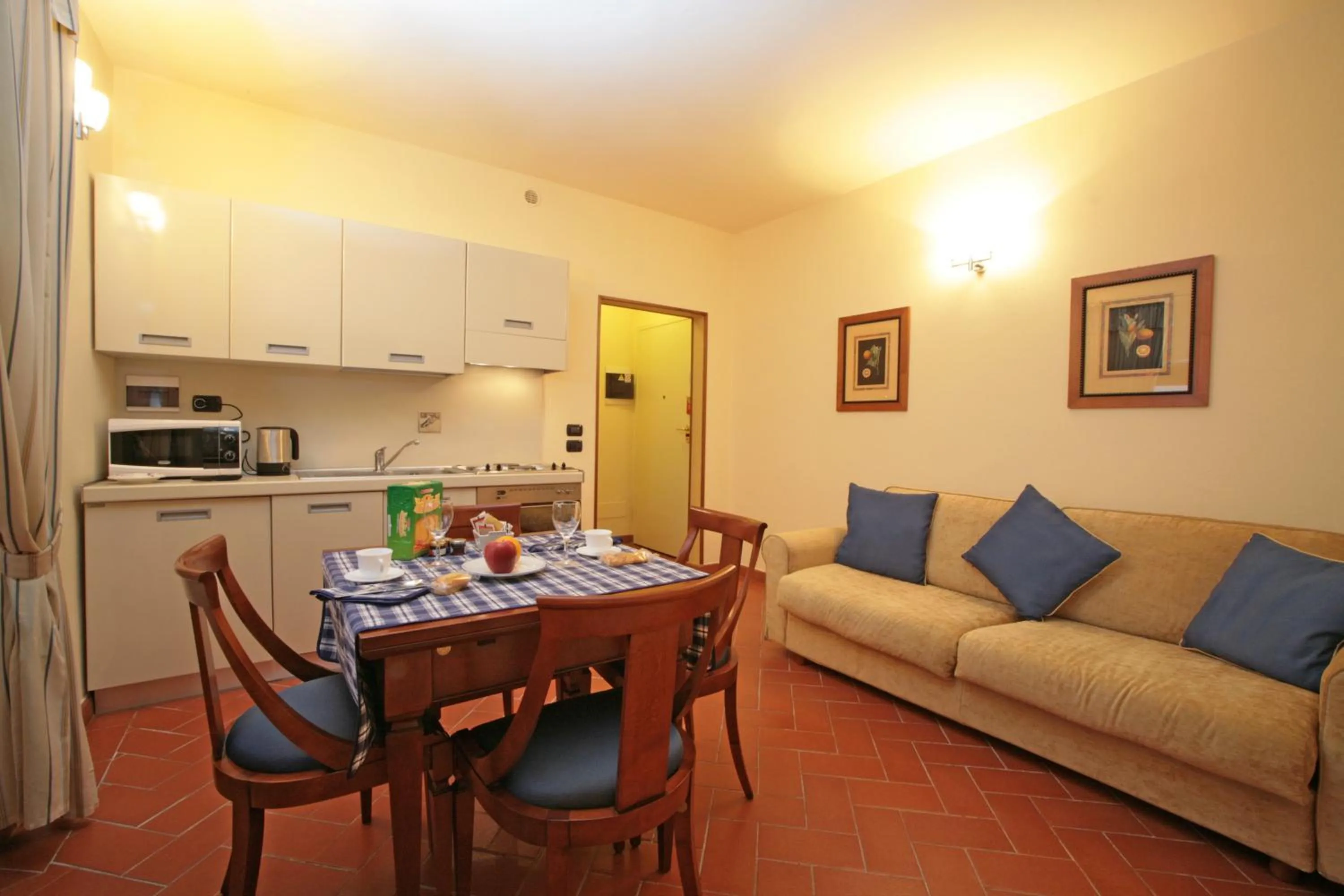 Kitchen or kitchenette in Palazzo Gamba Apartments al Duomo