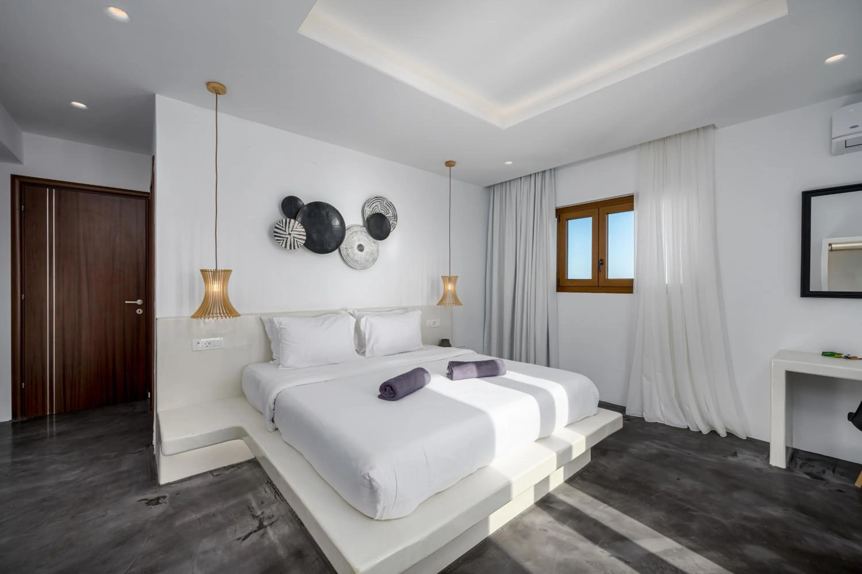 Bed in Leon Luxury Suites