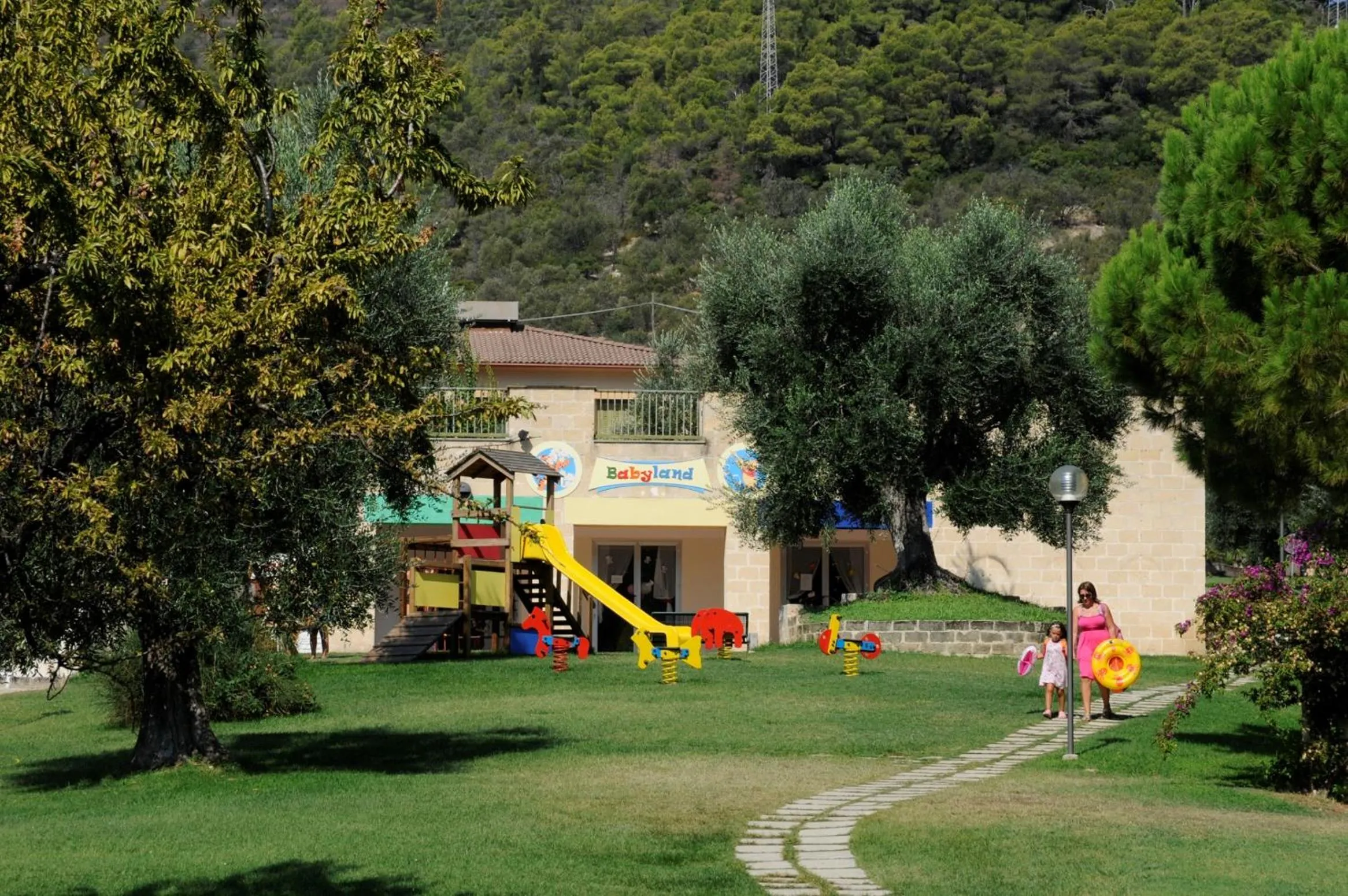 Children play ground in Pugnochiuso Resort Hotel del Faro