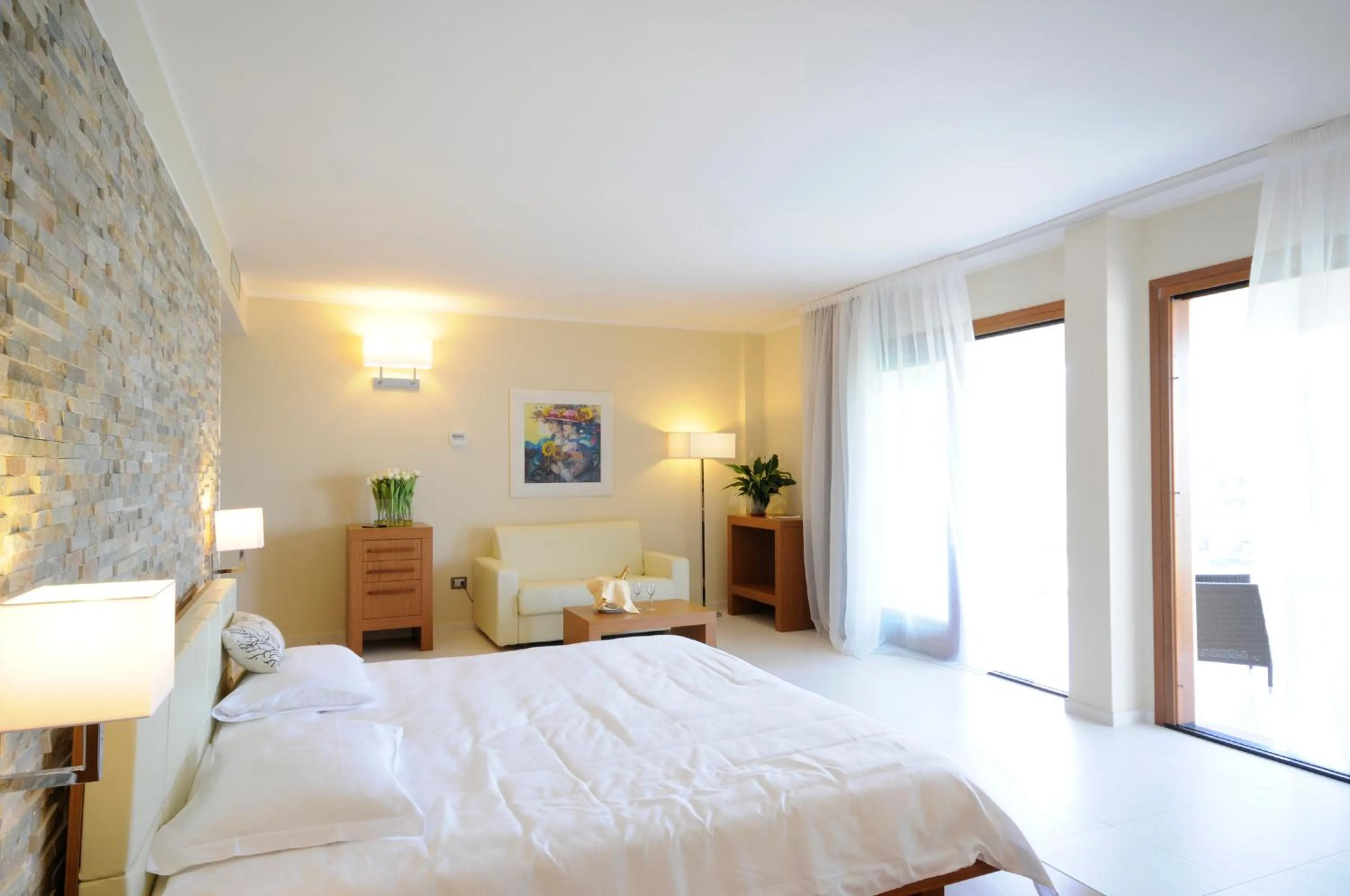 Bed in Pugnochiuso Resort Hotel del Faro