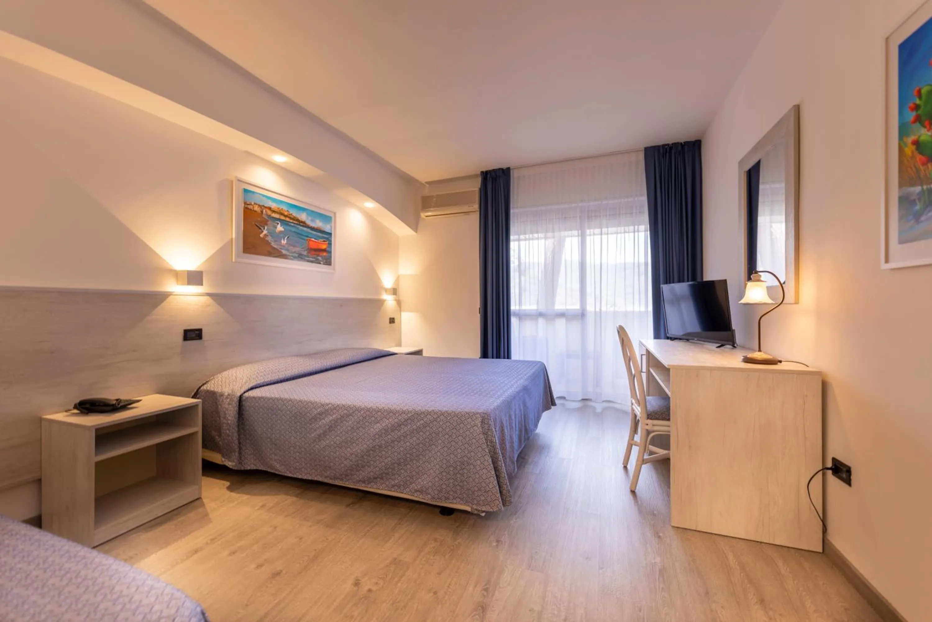 Bedroom in Pugnochiuso Resort Hotel del Faro