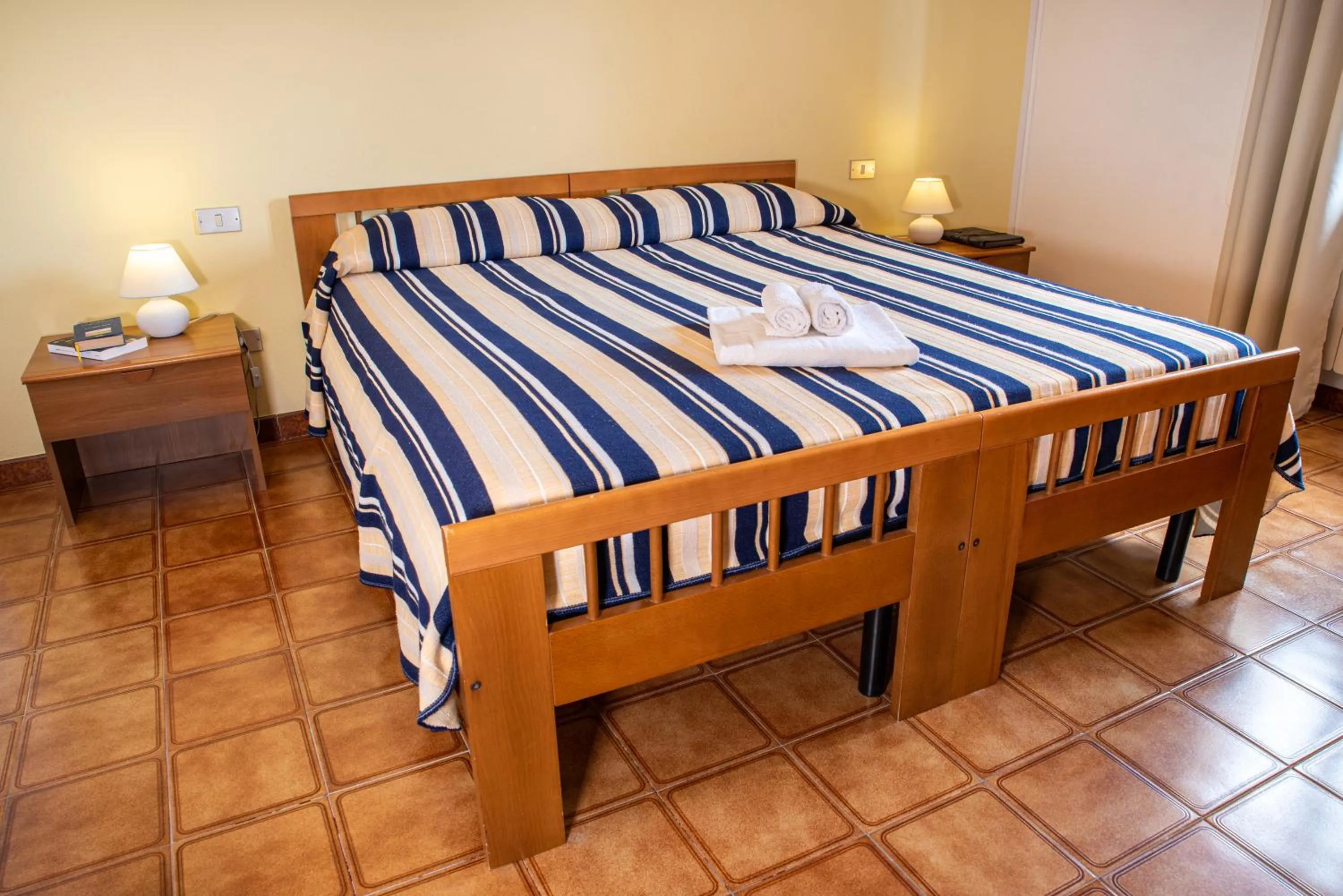 Bed in Hotel L'Aragosta