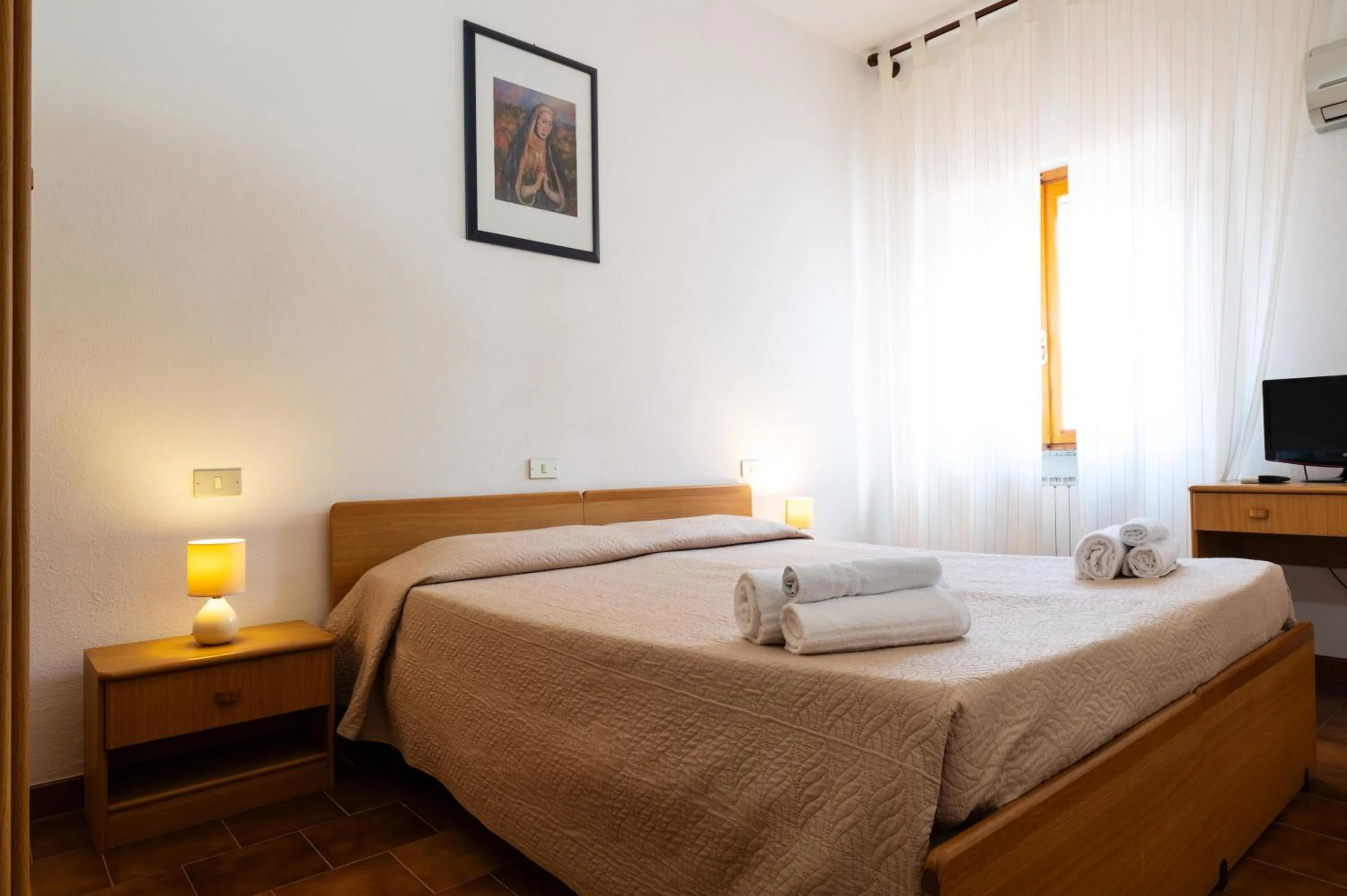 Bed in Hotel L'Aragosta