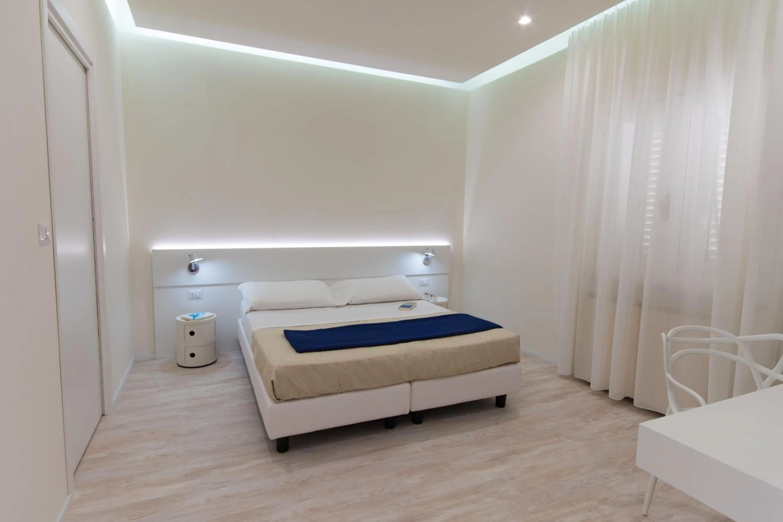 Bed in Hotel L'Aragosta