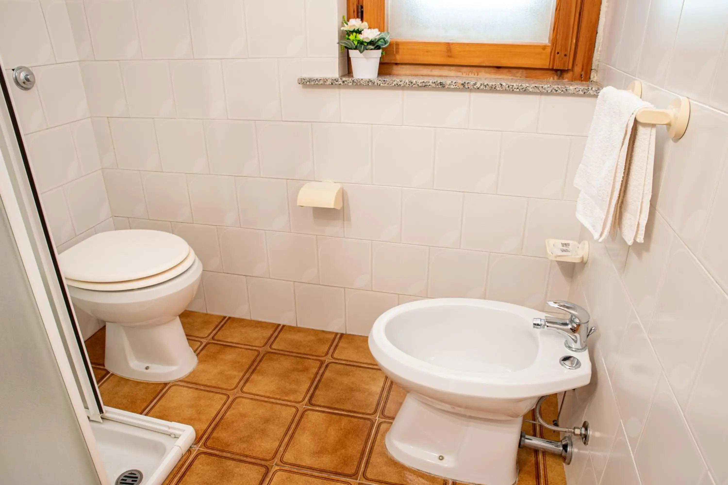 Economy Triple Room in Hotel L'Aragosta Economy Triple Room in Hotel L'Aragosta