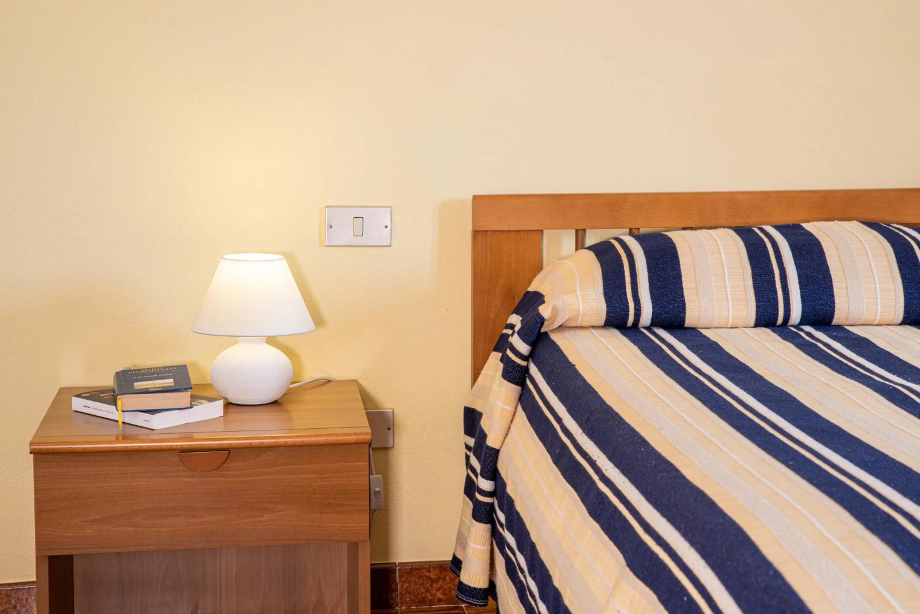 Bed in Hotel L'Aragosta