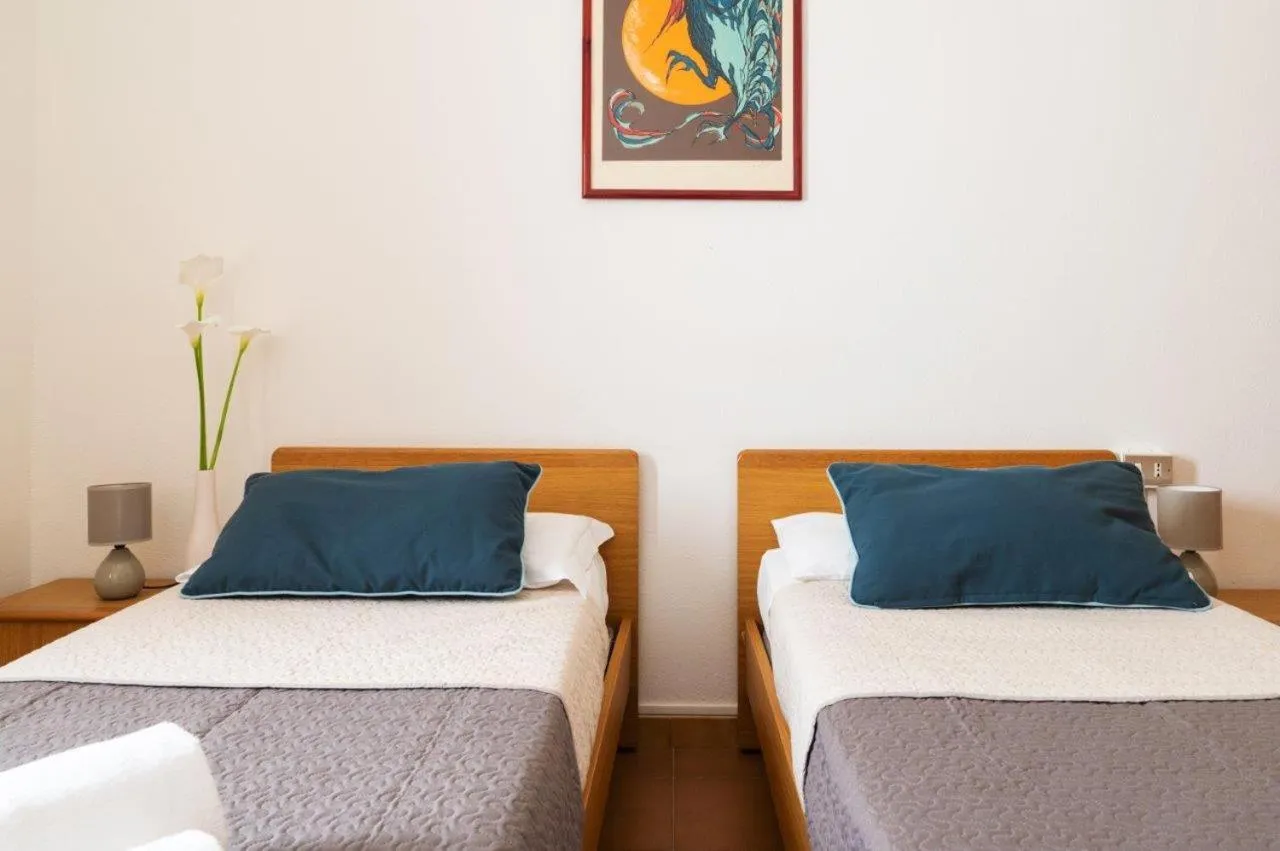 Bed in Hotel L'Aragosta