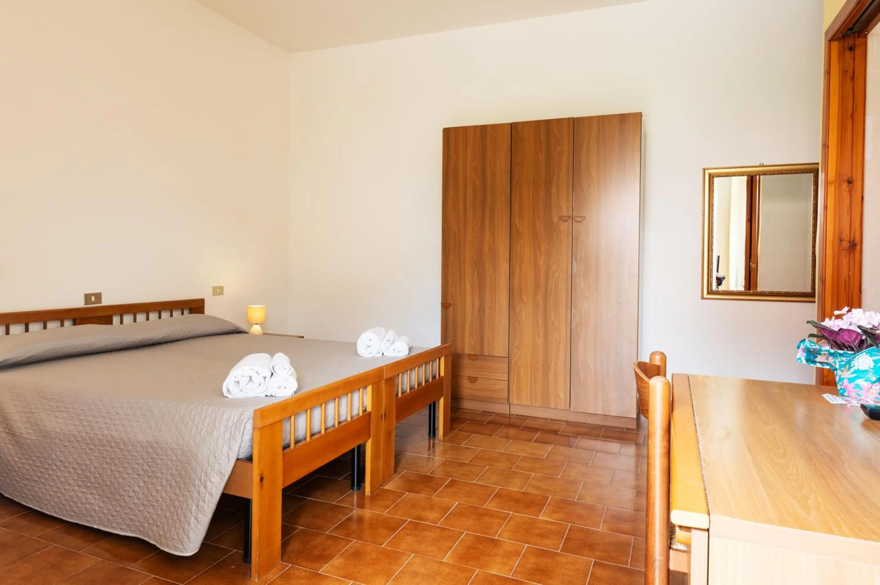 Bed in Hotel L'Aragosta