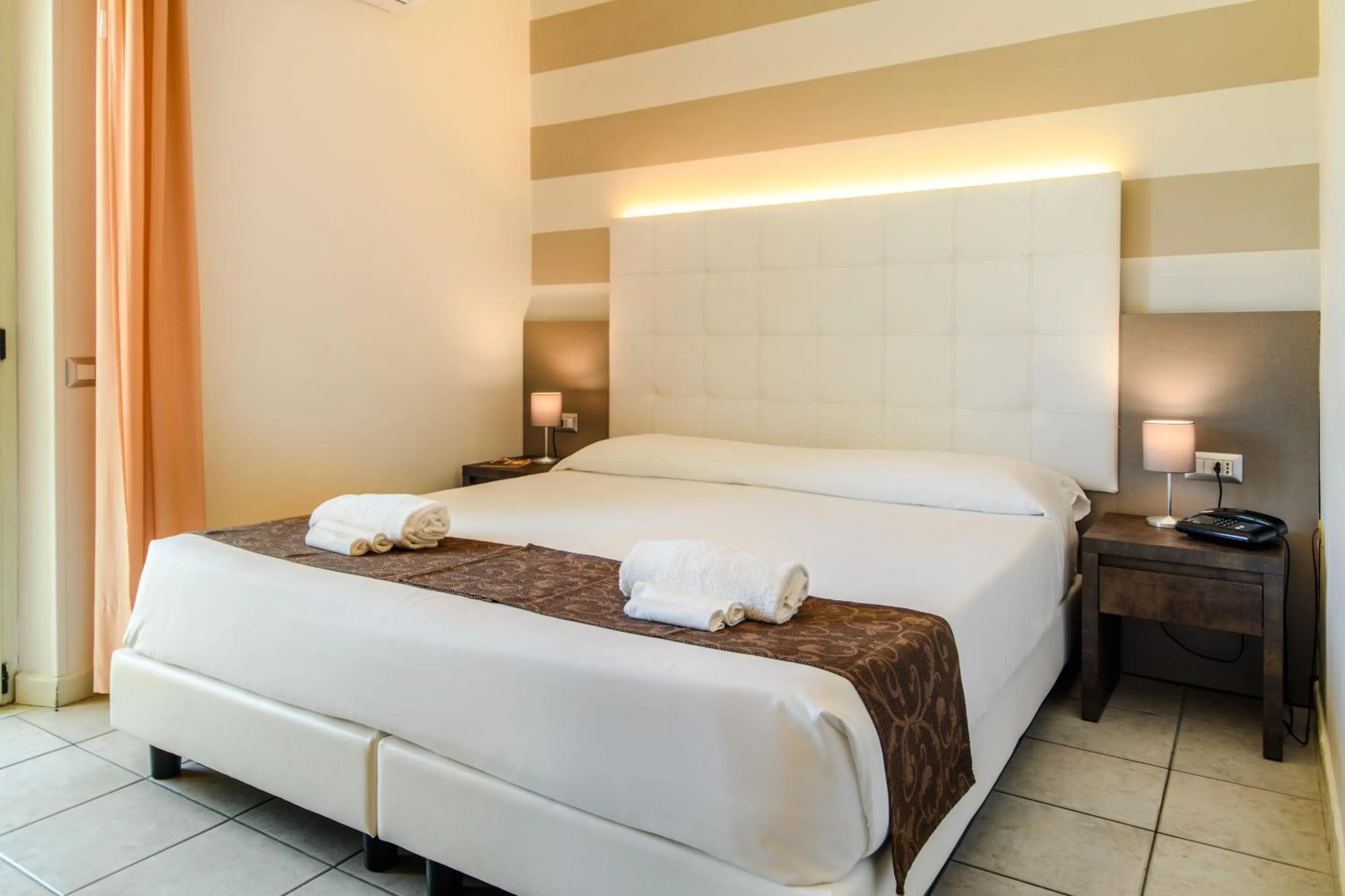 Bed in Hotel Tirreno