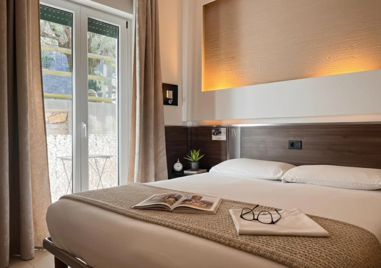 Bed in Hotel Isola Verde