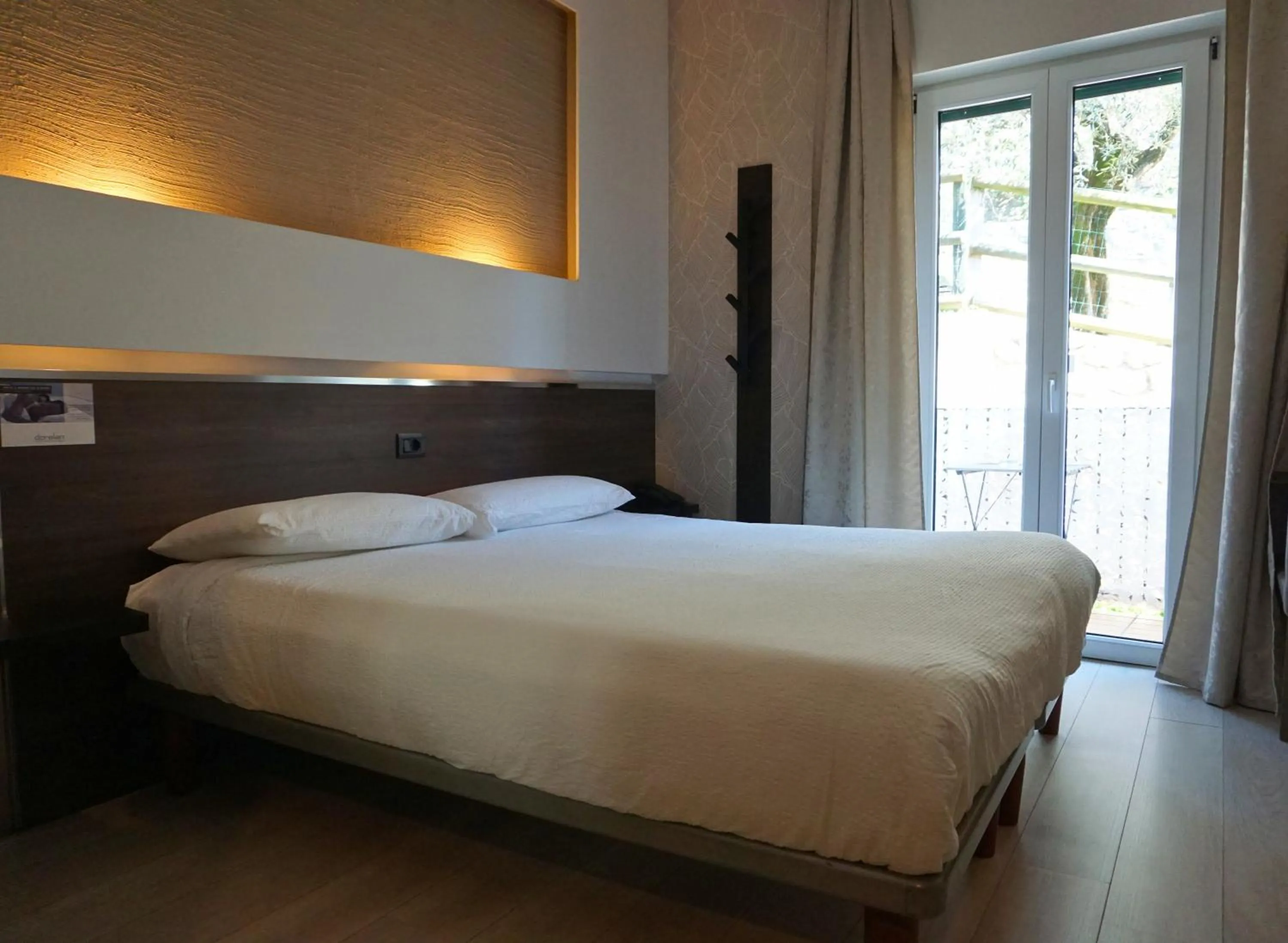 Bed in Hotel Isola Verde