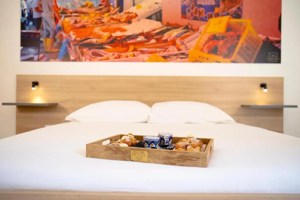 Bed in Ballaro' Hotel - Budget Room