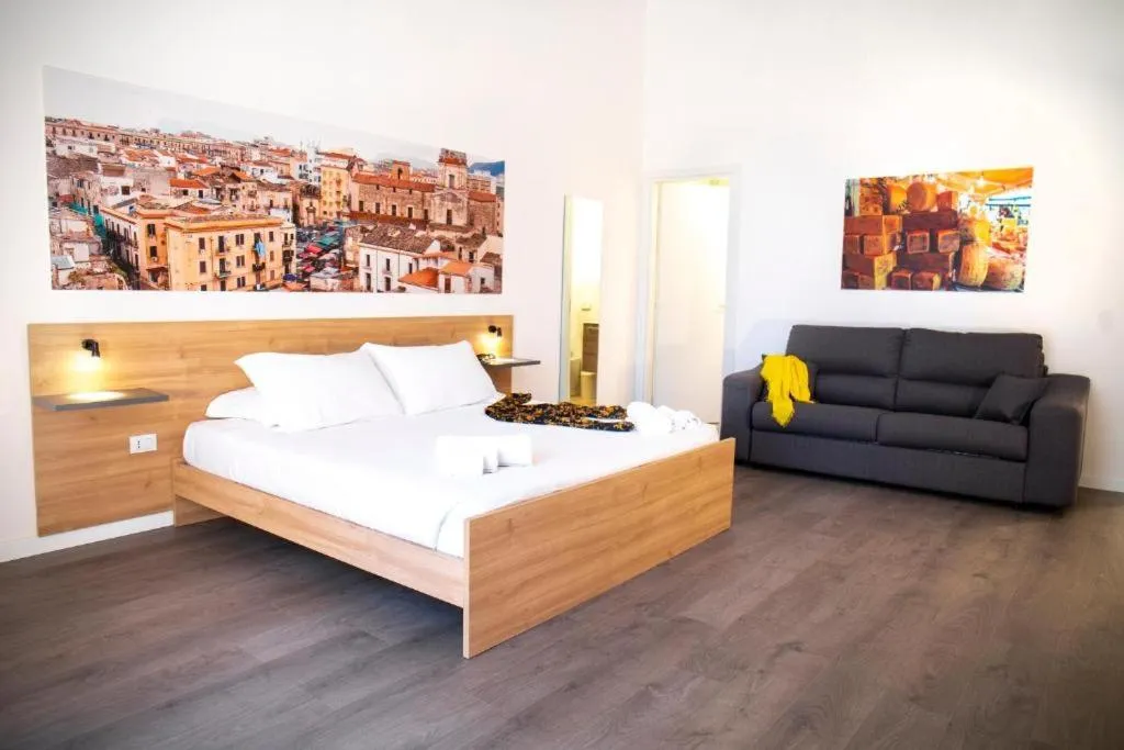 Bed in Ballaro' Hotel - Budget Room