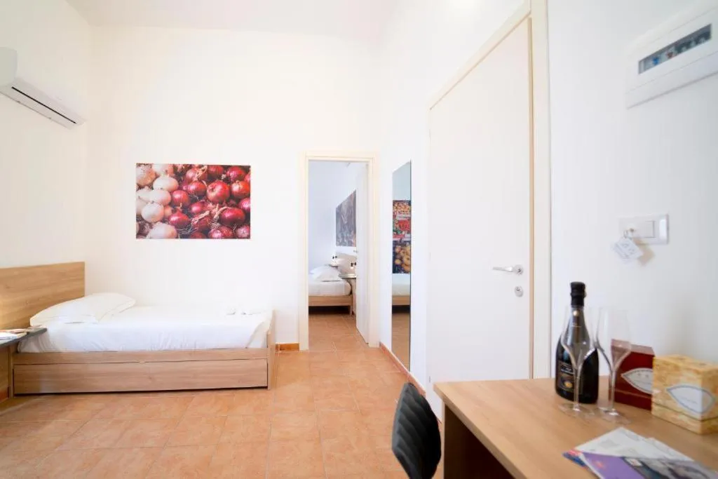 Bed in Ballaro' Hotel - Budget Room