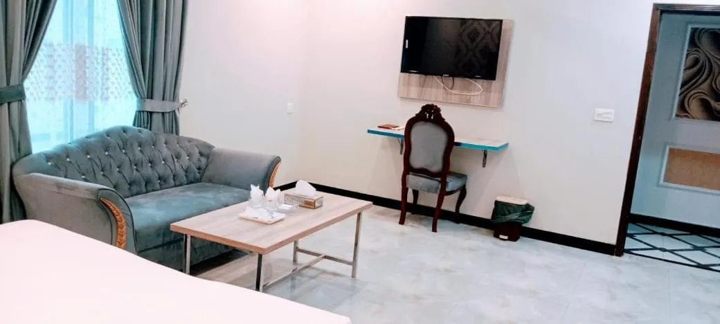 Bed in Grand Swiss Hotel&Apartment Lahore