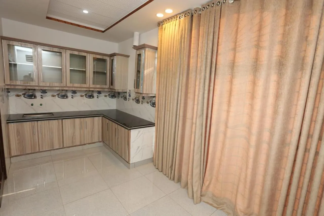 Kitchen or kitchenette in Grand Swiss Hotel&Apartment Lahore