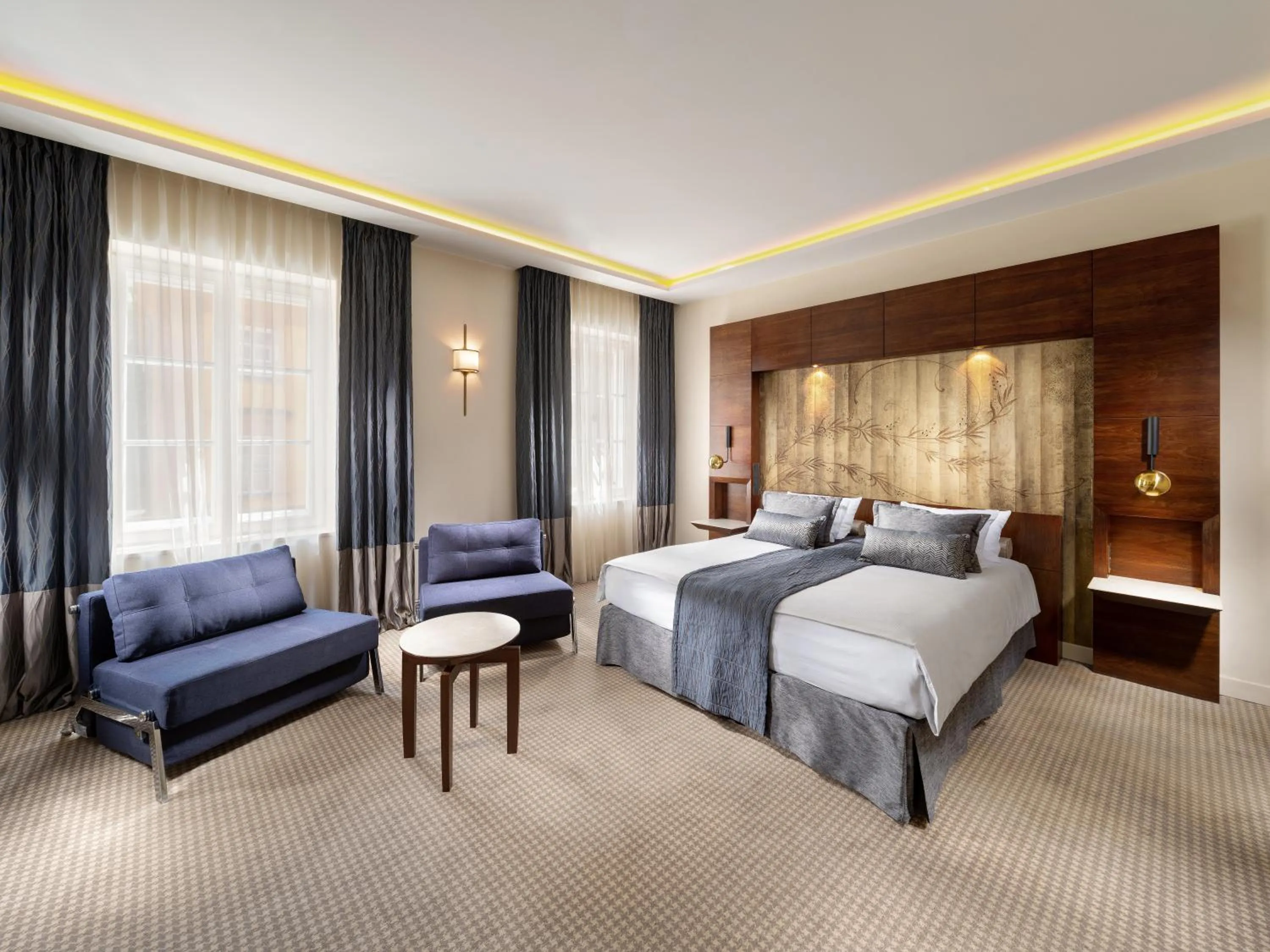 Bed in Mamaison Le Regina Boutique Hotel