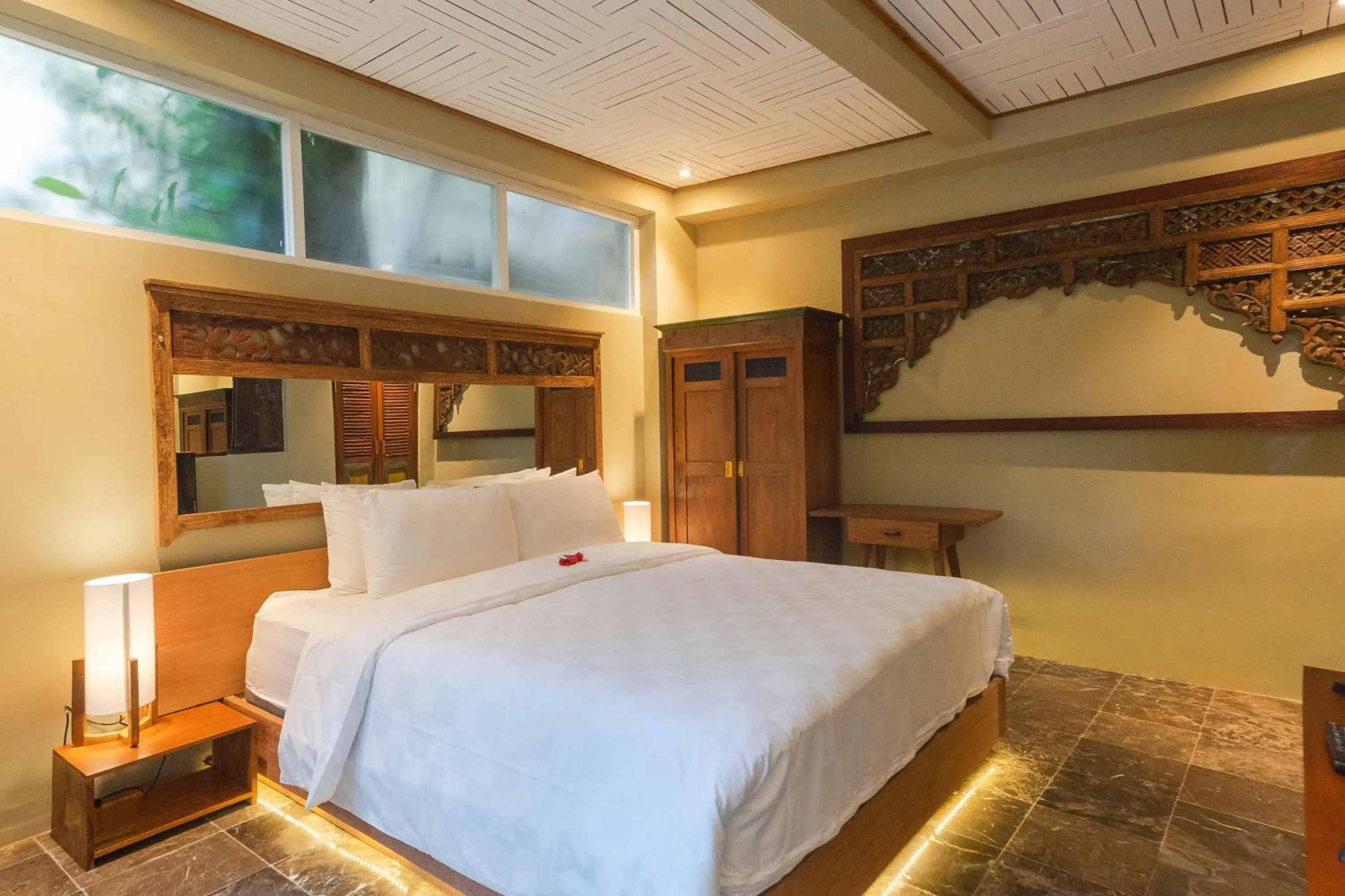 Bed in Nayaka Living Ubud