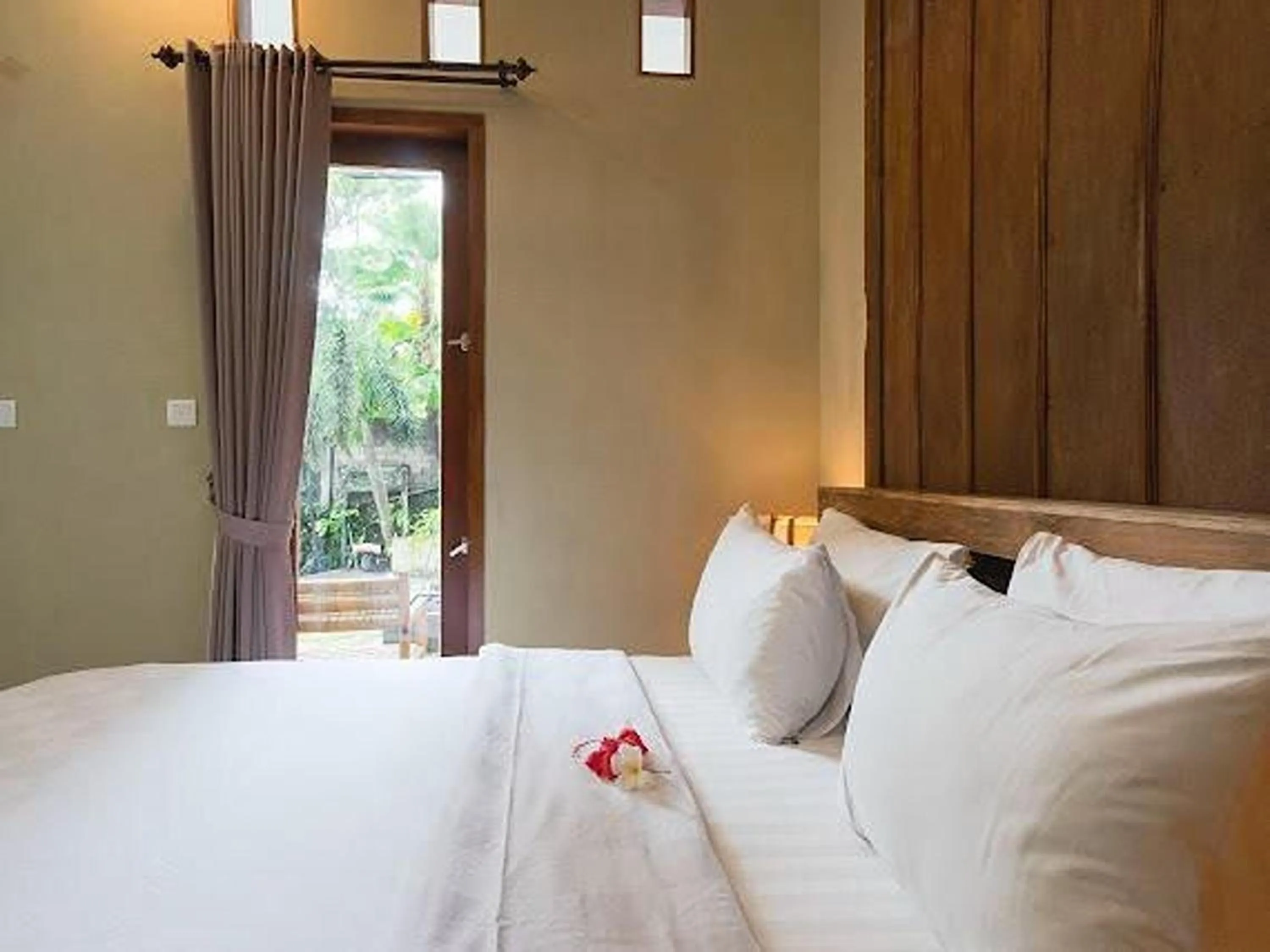 Bed in Nayaka Living Ubud
