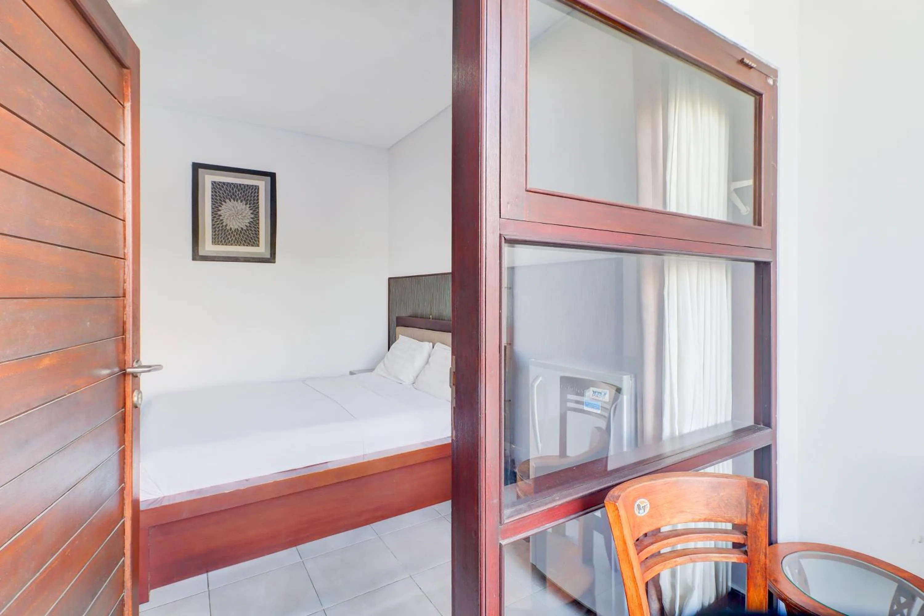 Photo of the whole room, Bed in Collection O Bali near Keonganan Beach formerly New Asta Graha Homestay