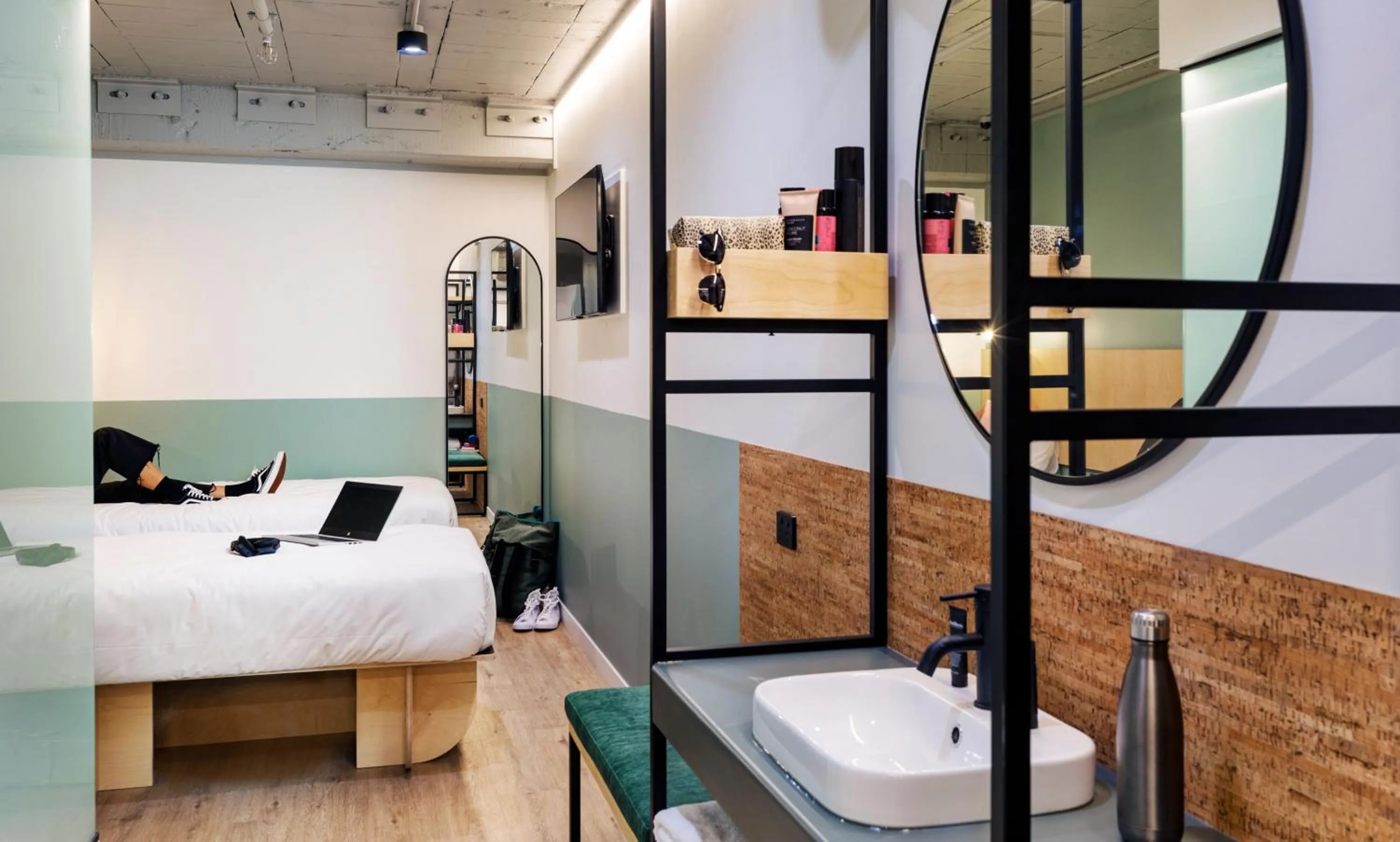 Bed in LyLo Auckland Hotel