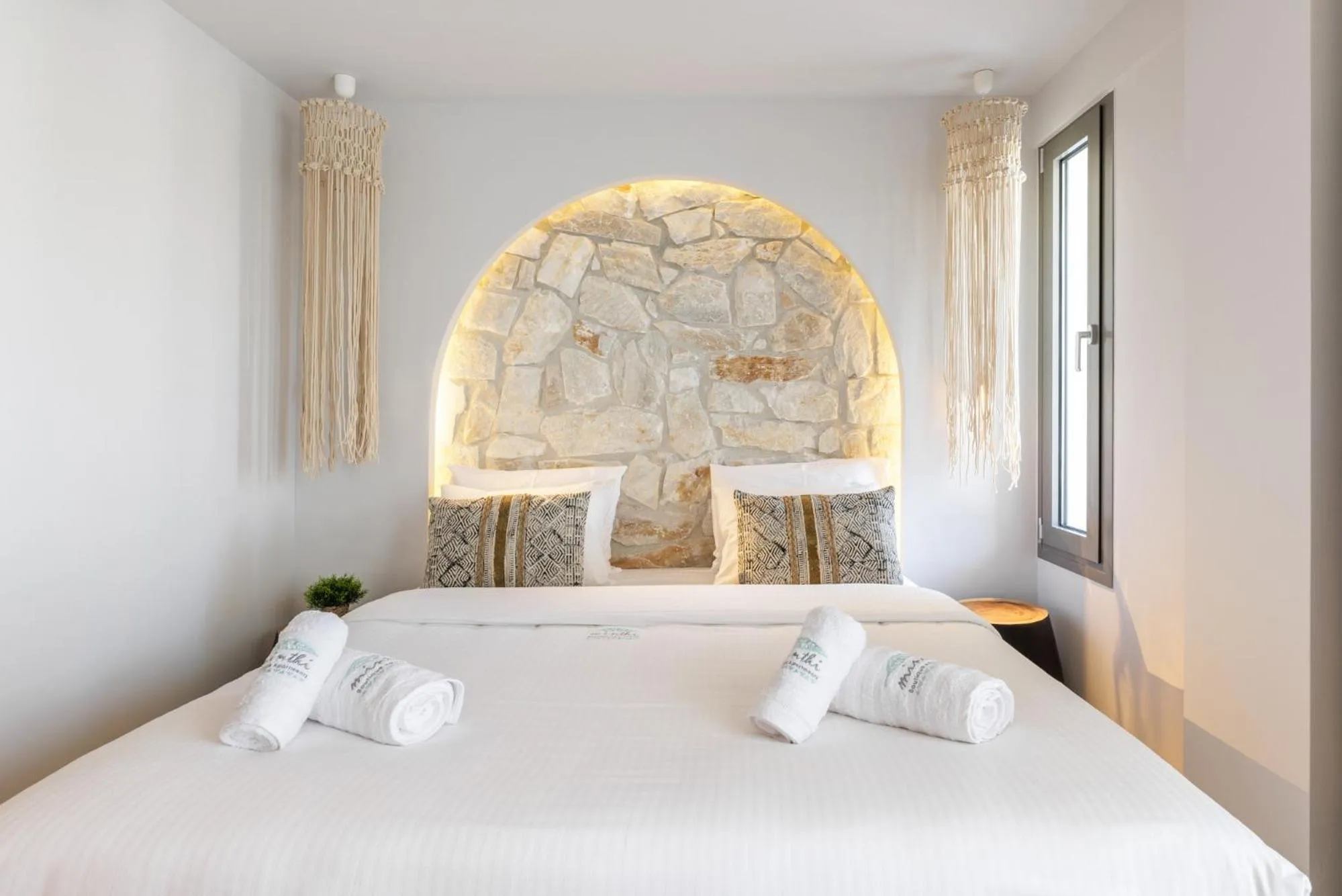 Bed in Amalthia Luxury Suites