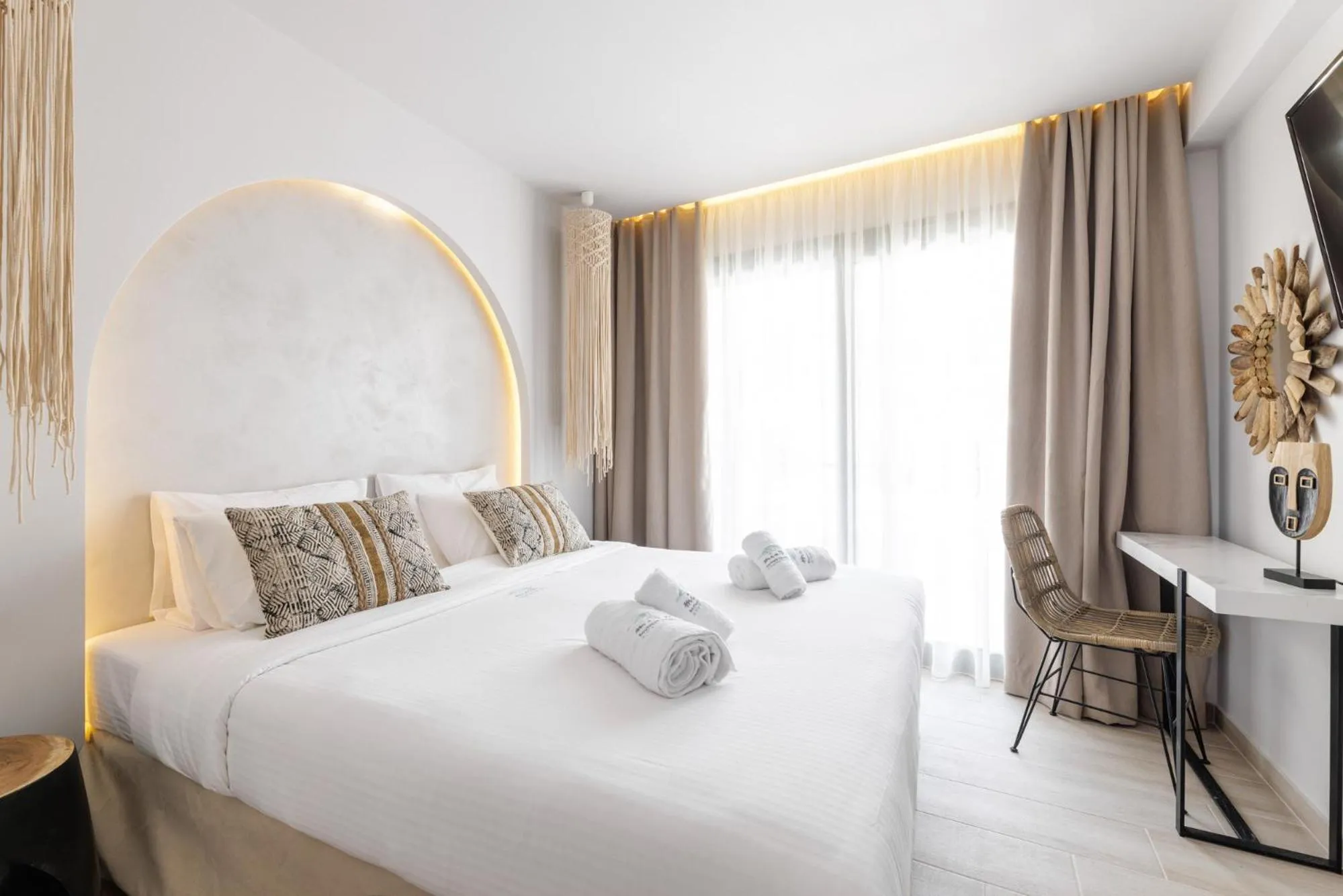 Bed in Amalthia Luxury Suites