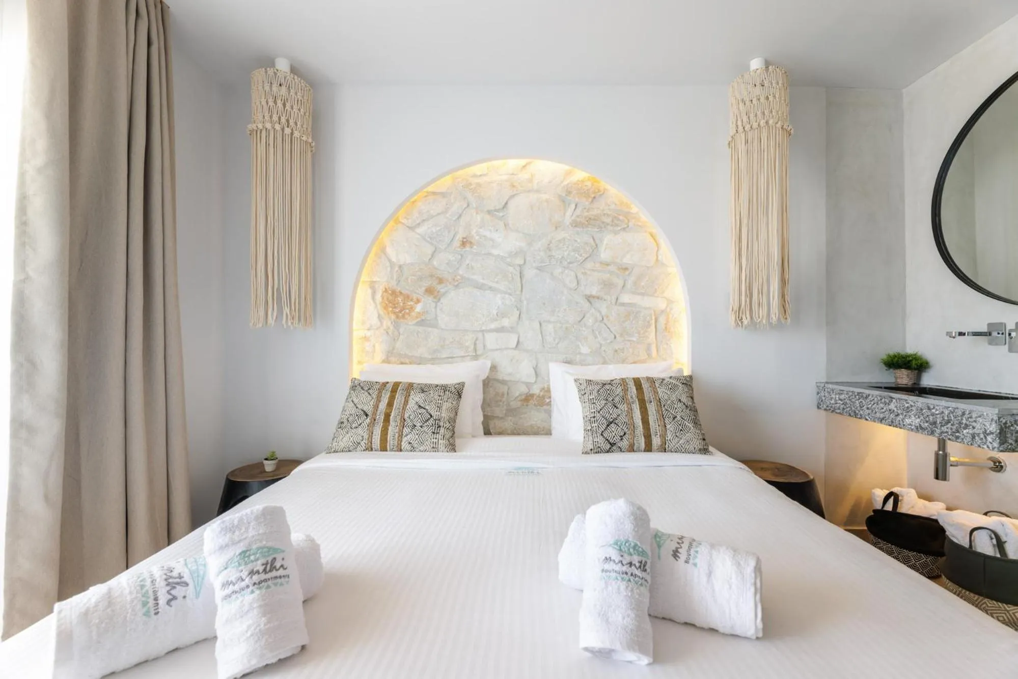 Bed in Amalthia Luxury Suites