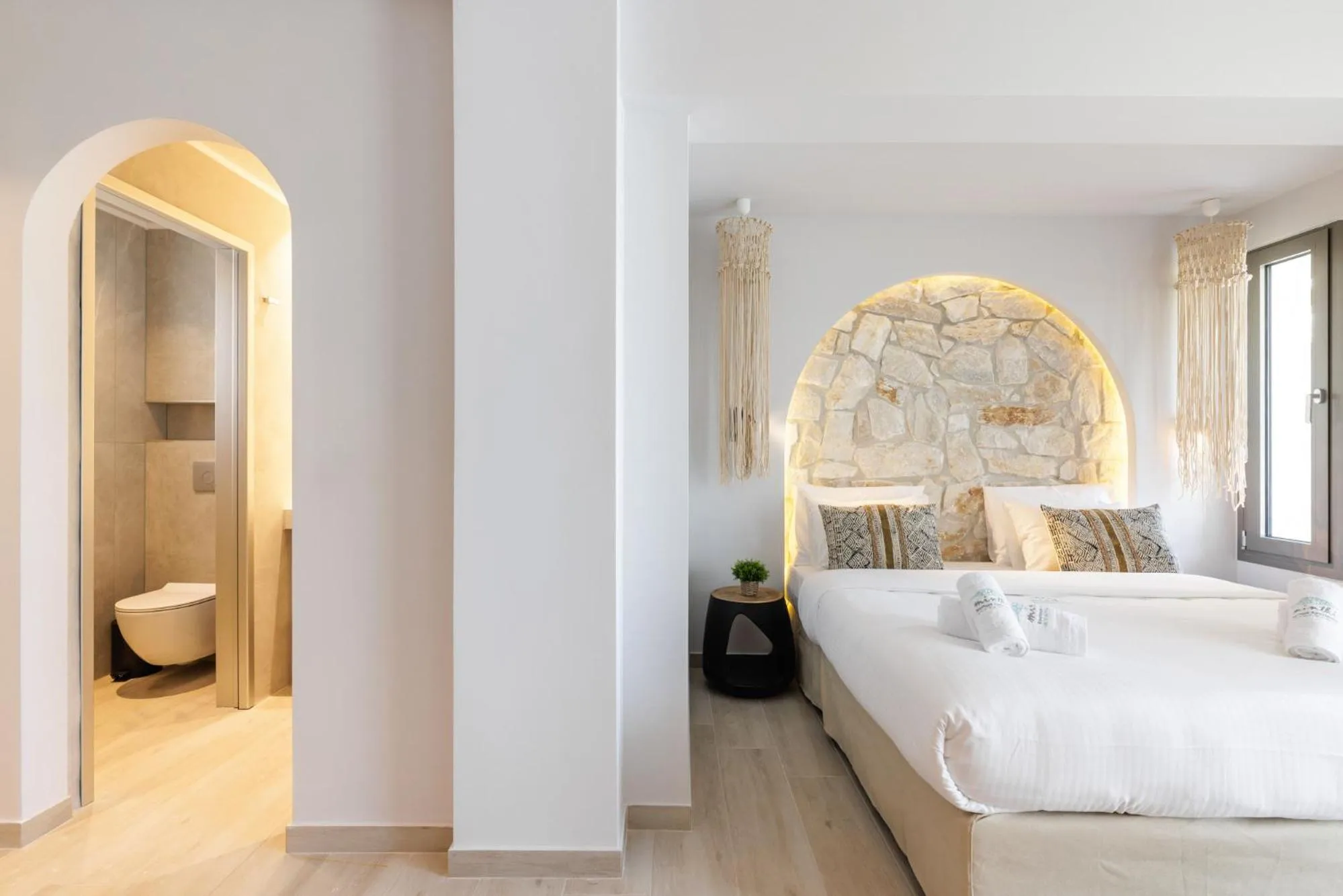 Toilet, Bed in Amalthia Luxury Suites