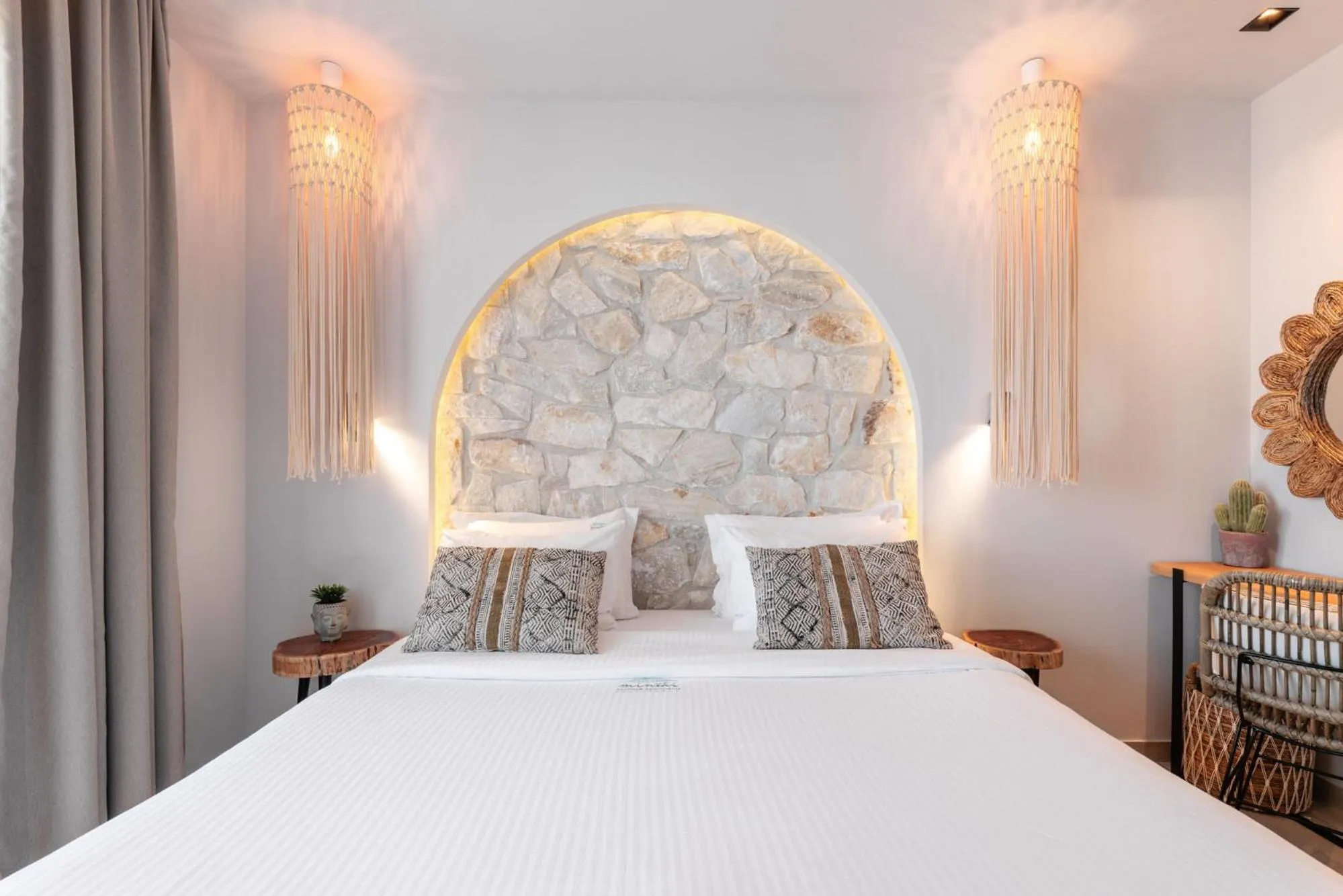 Bed in Amalthia Luxury Suites