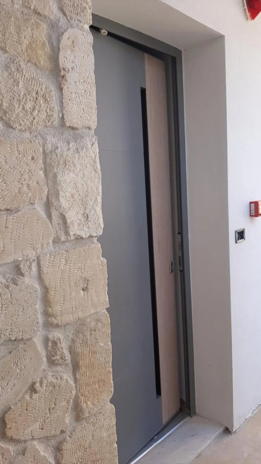 Facade/entrance in Amalthia Luxury Suites