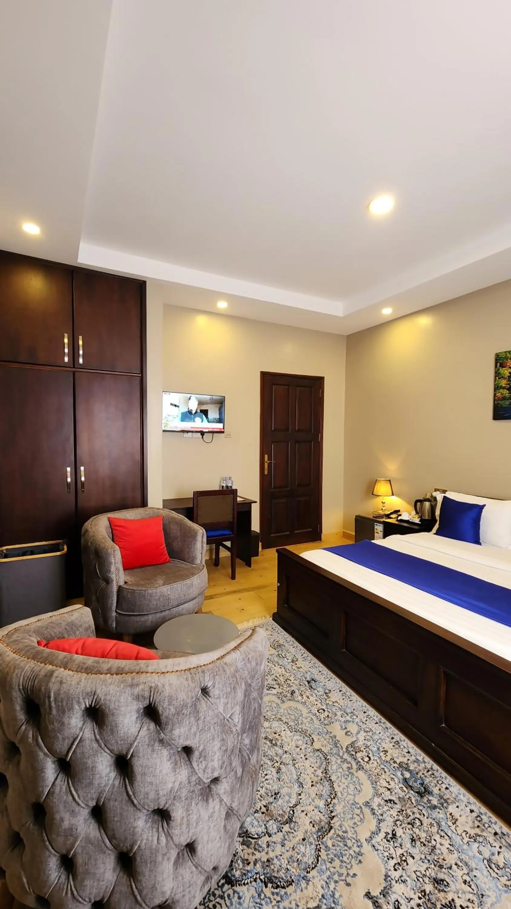 Communal lounge/ TV room in Golden Castle Hotel Hoima