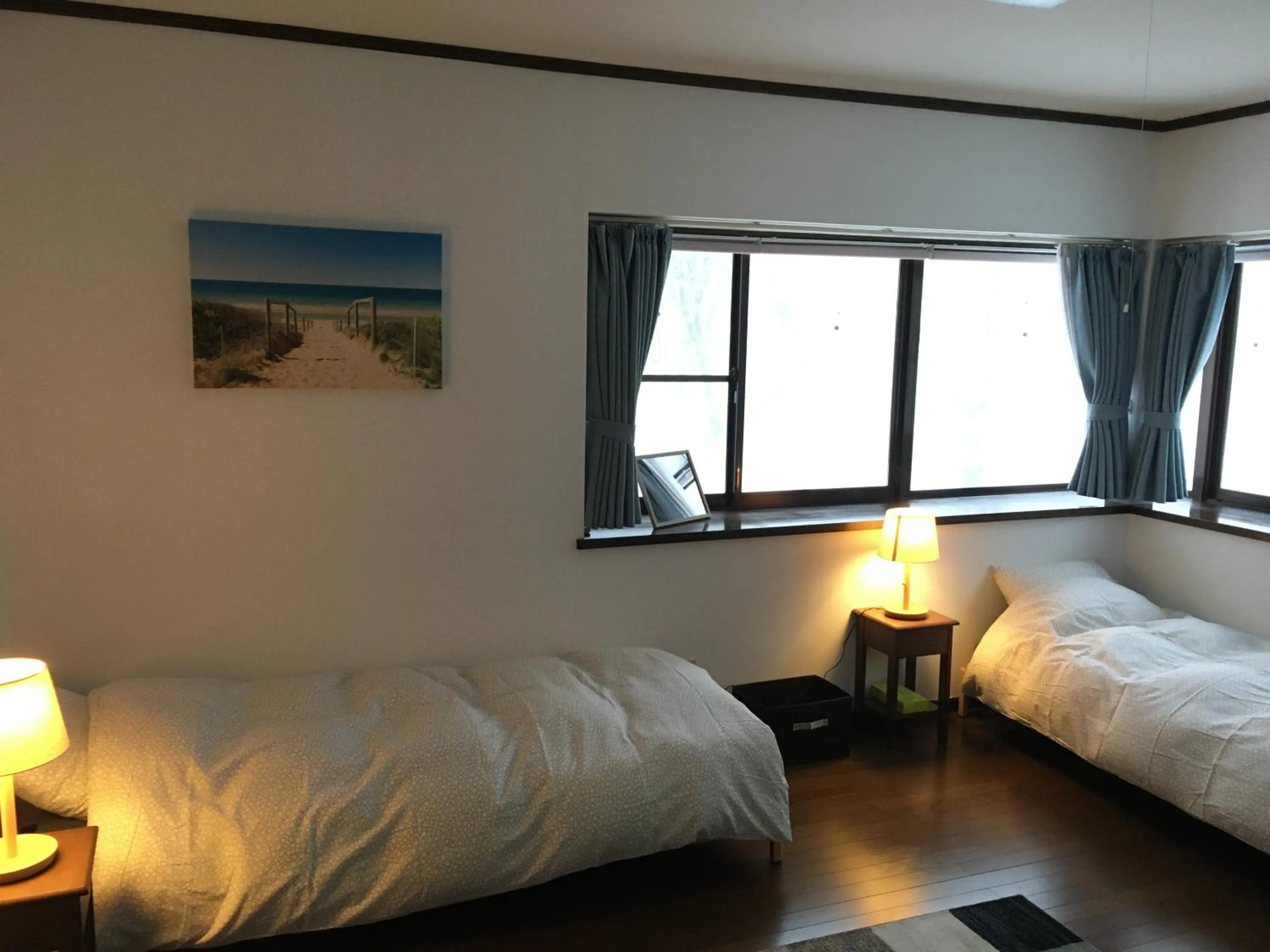 Bed in Myoko Woodland Lodge