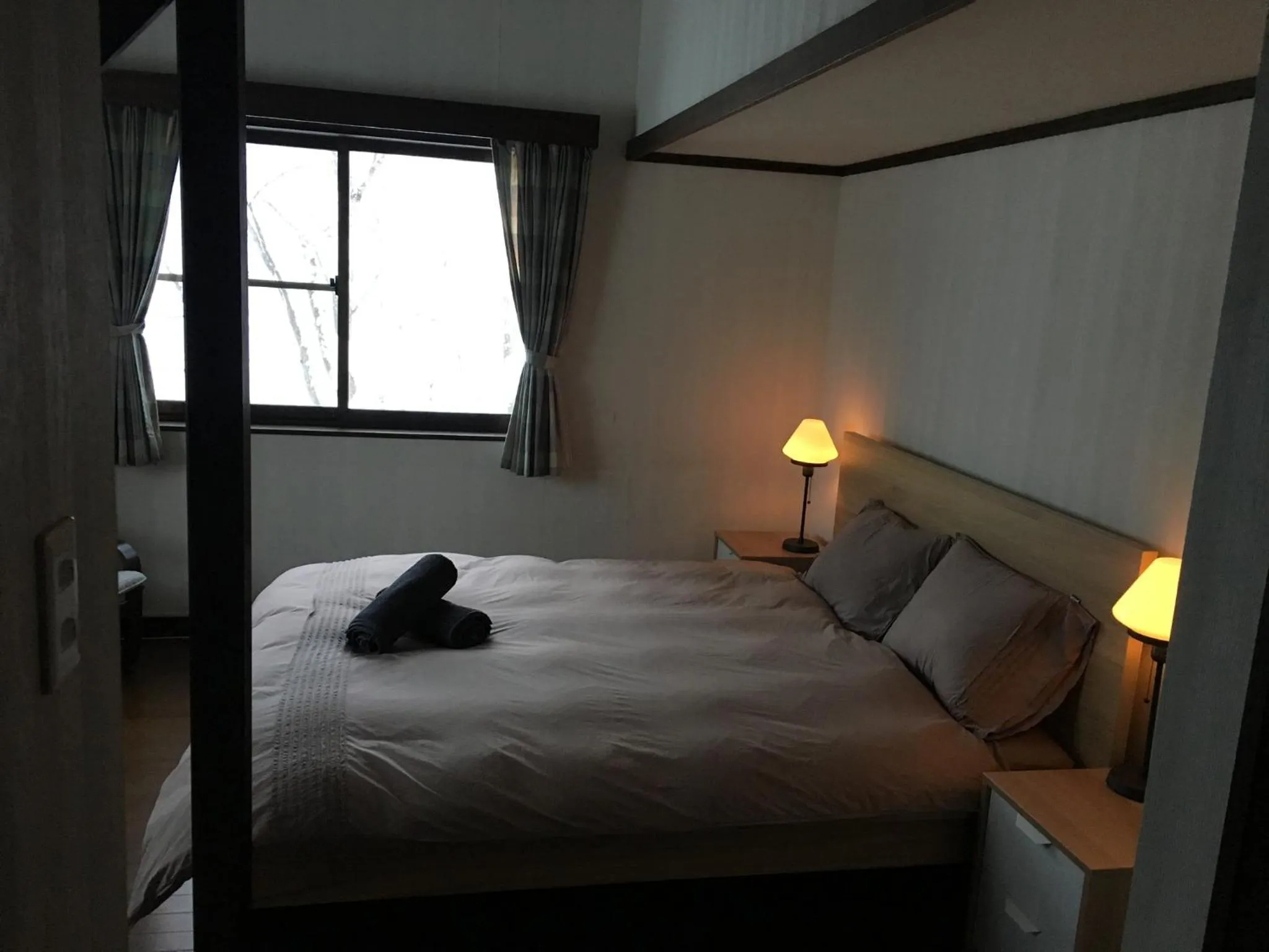 Bed in Myoko Woodland Lodge