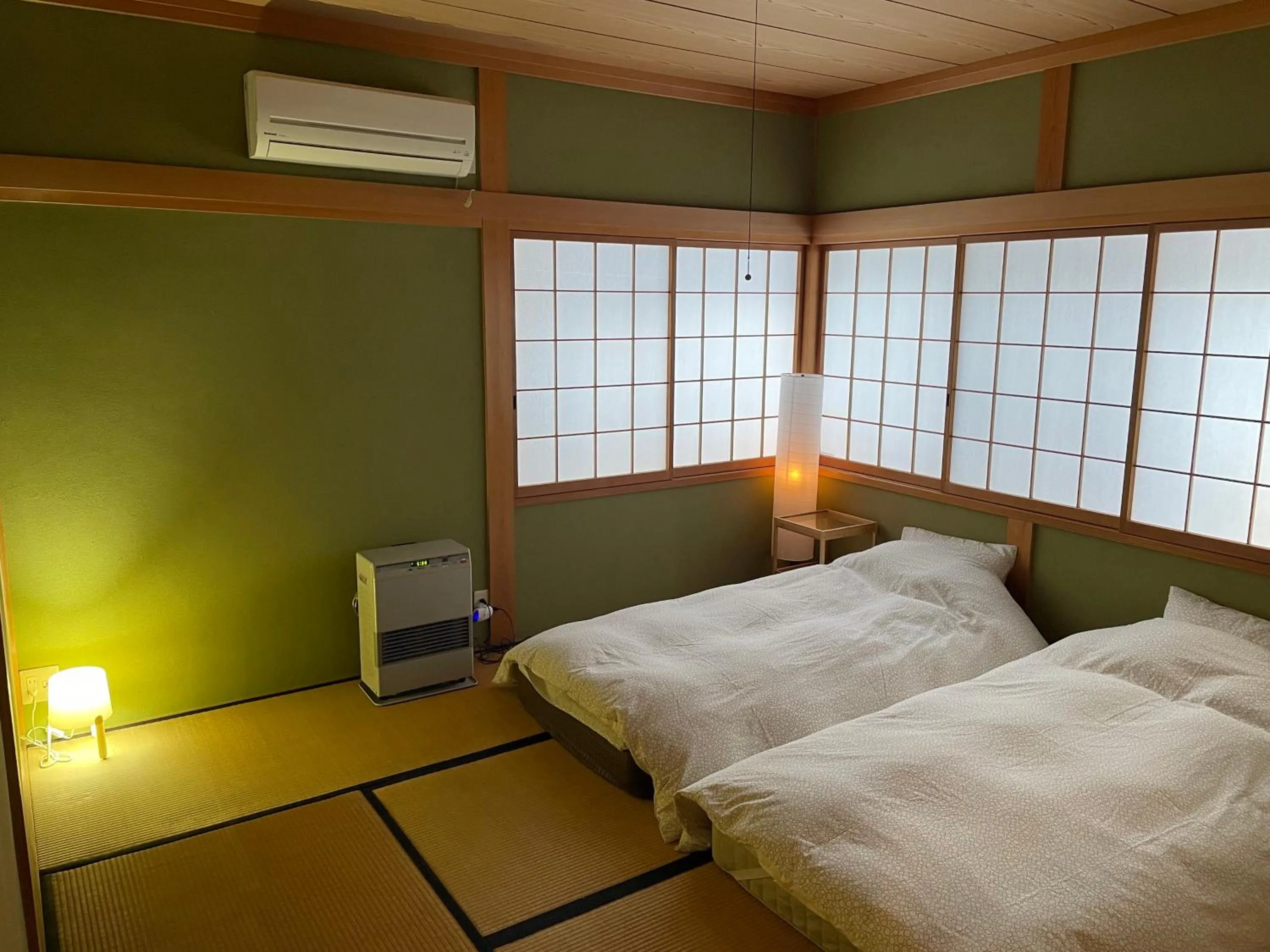 Bed in Myoko Woodland Lodge