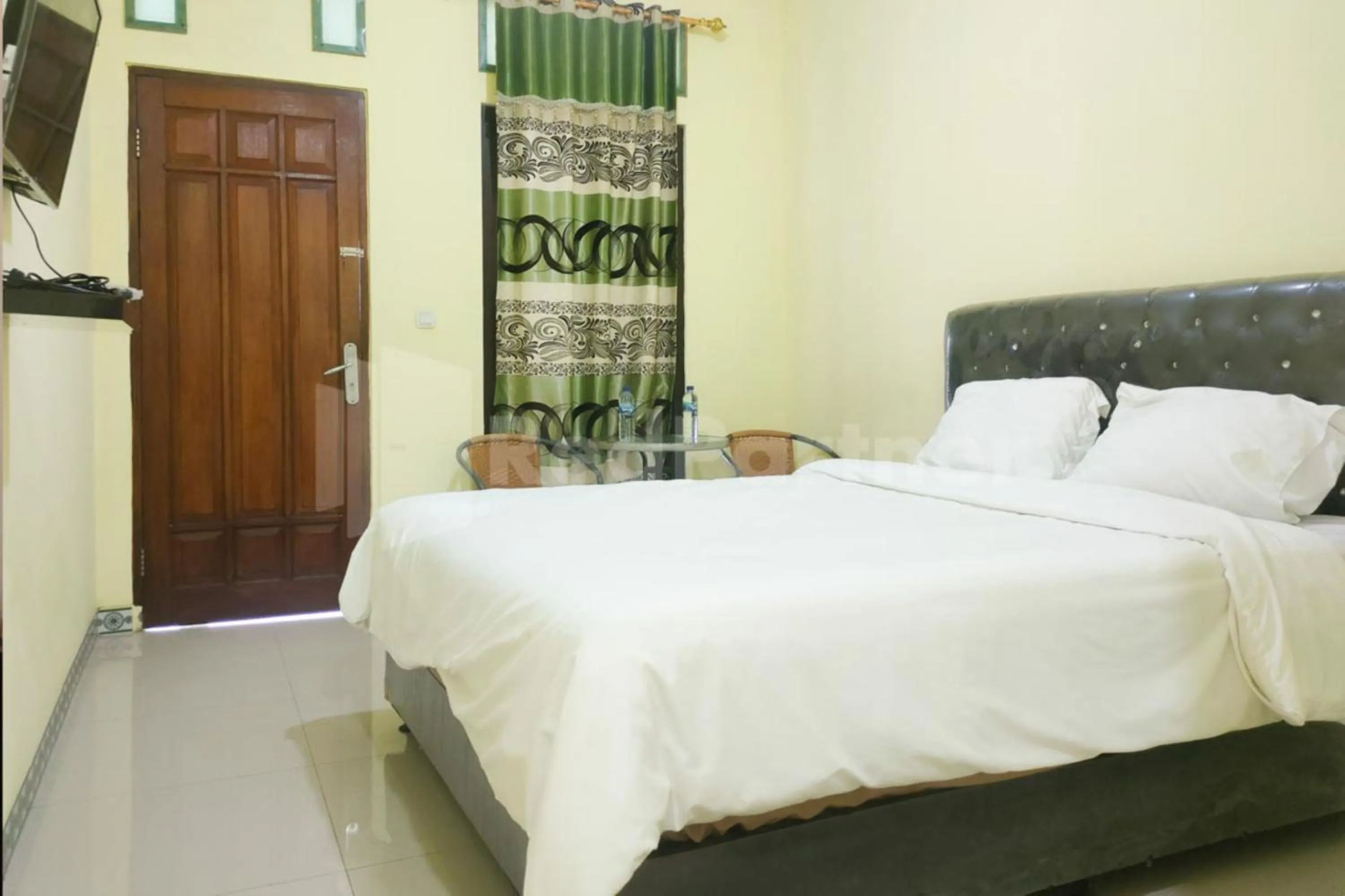 Bed in Ambarita Seaview RedPartner