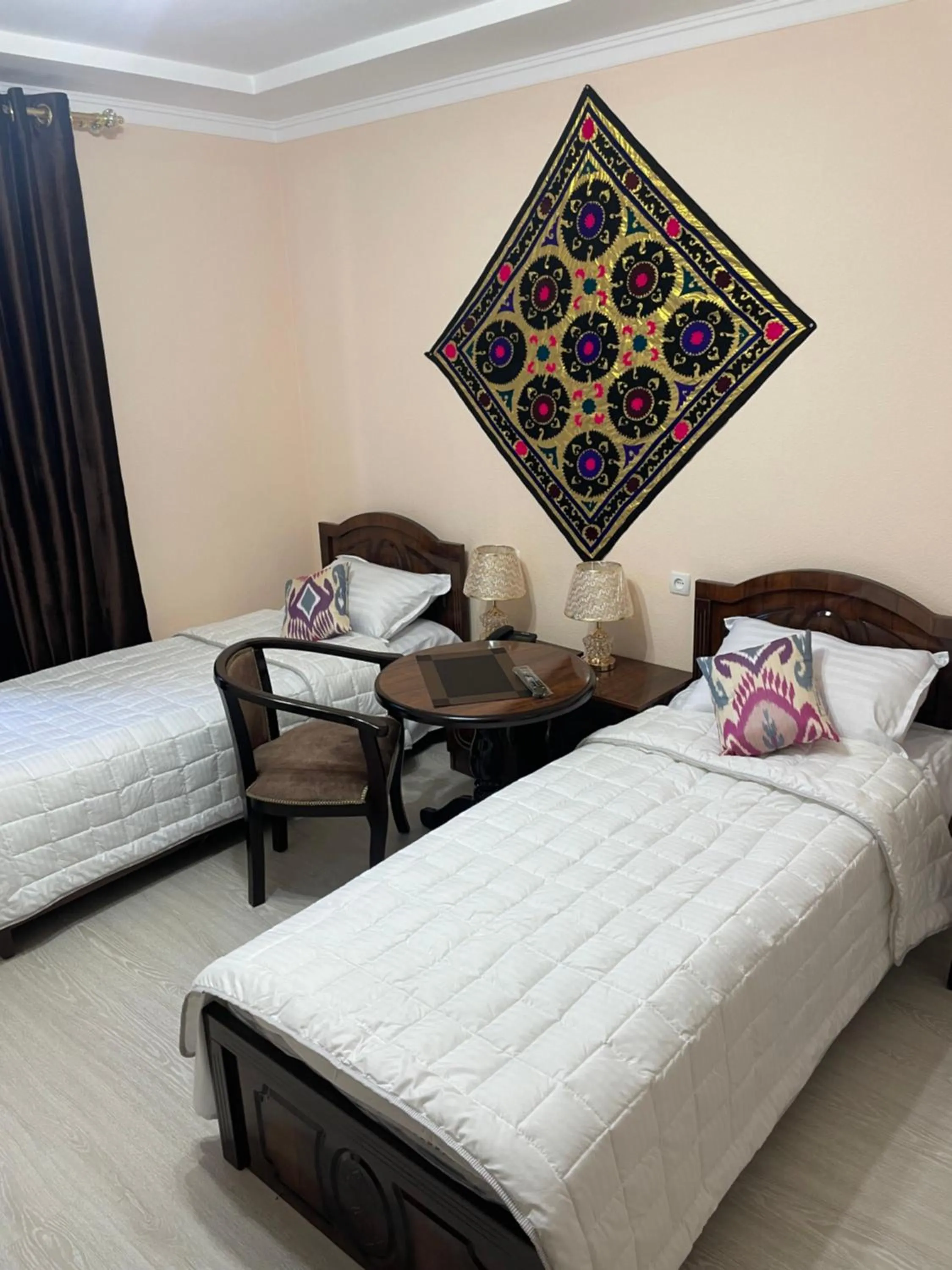 Bed in Hotel Samarkand Ali