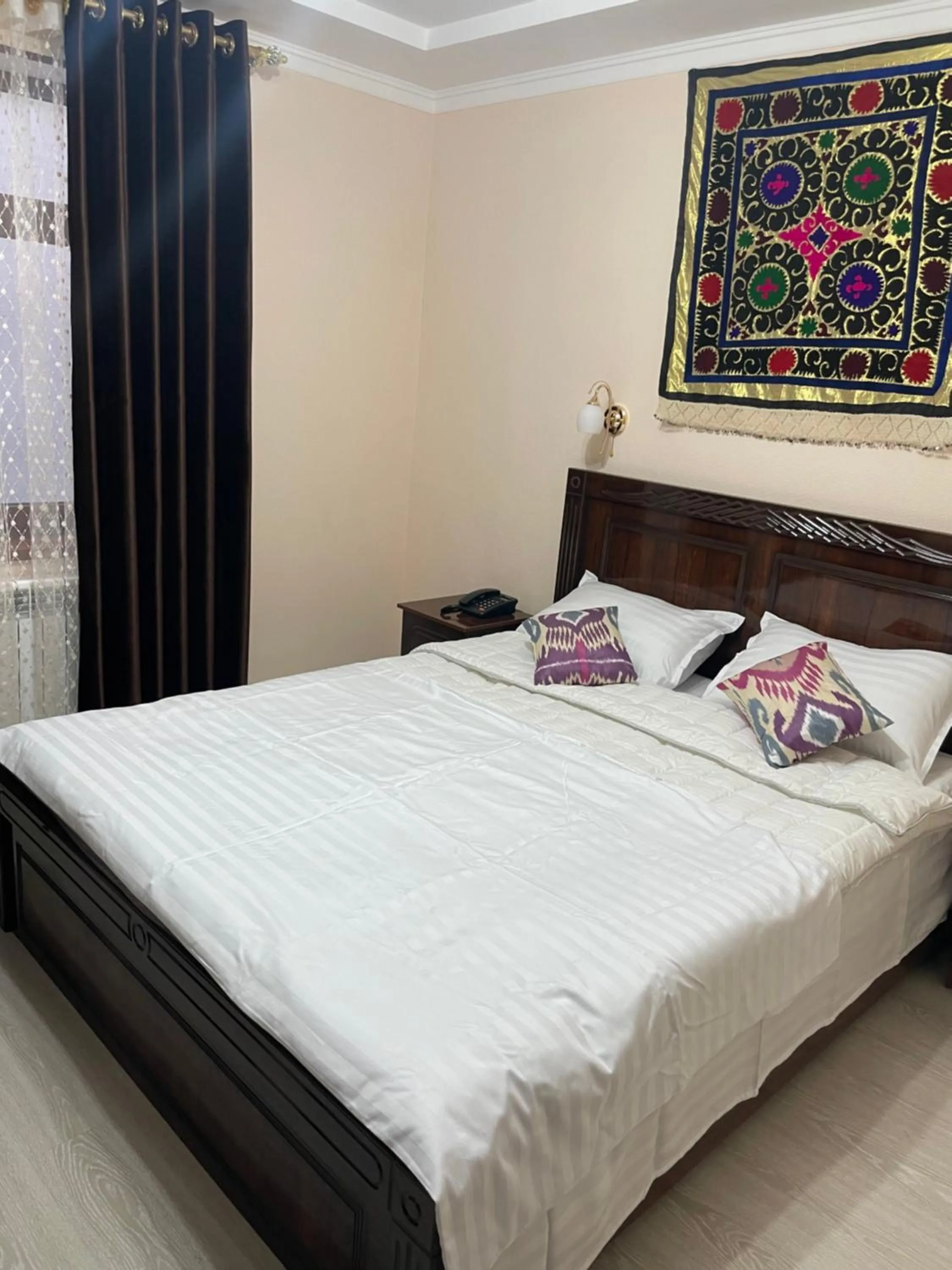 Bed in Hotel Samarkand Ali