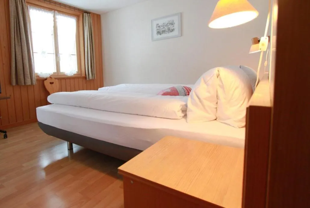 Bed in Kurhaus Heiligkreuz