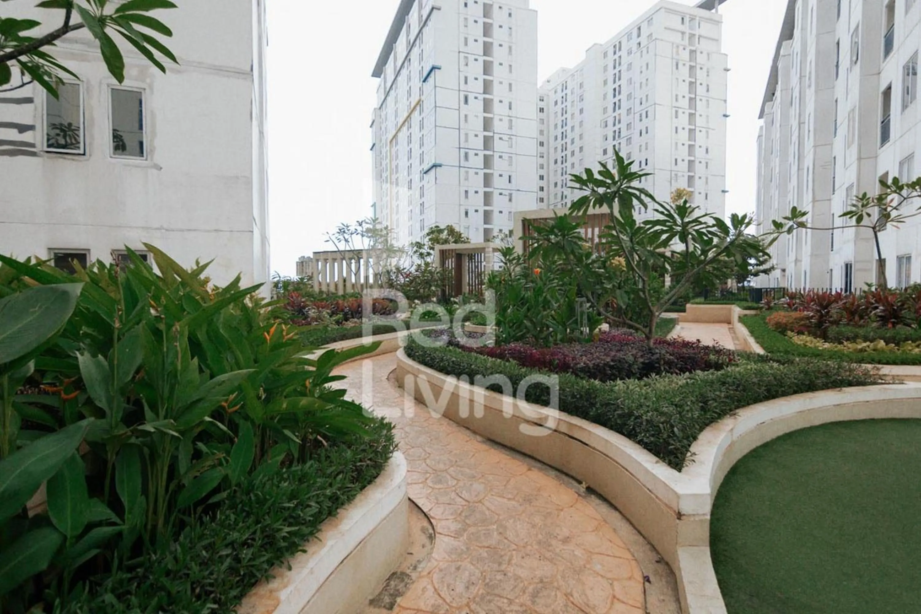 Garden in RedLiving Apartemen Bassura City - Aokla Property Tower Dahlia