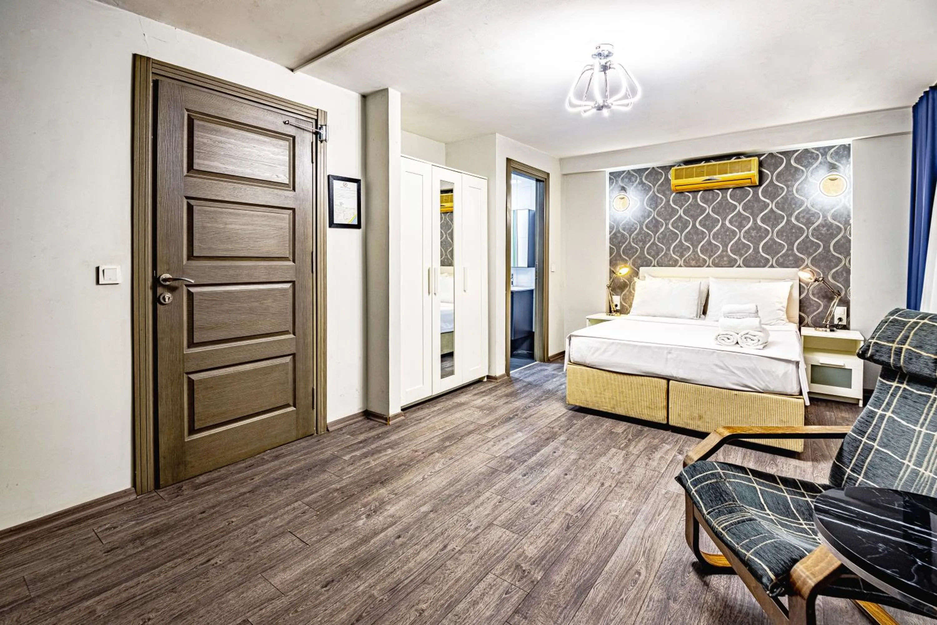 Photo of the whole room, Bed in Sultan Mansion