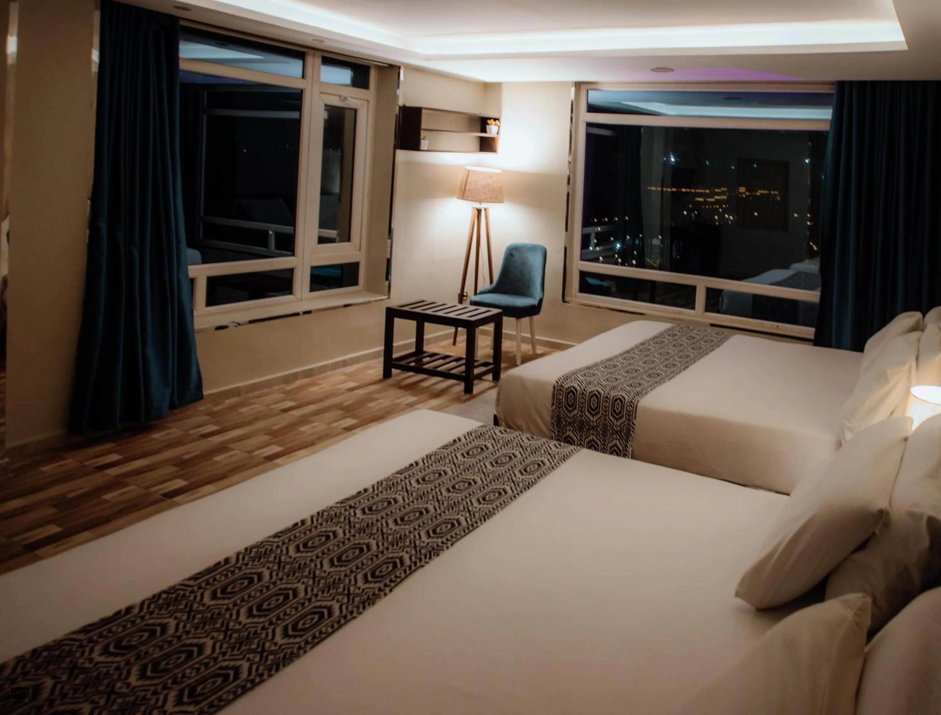 Bed in Turquoise Pyramids & Grand Egyptian museum view Hotel