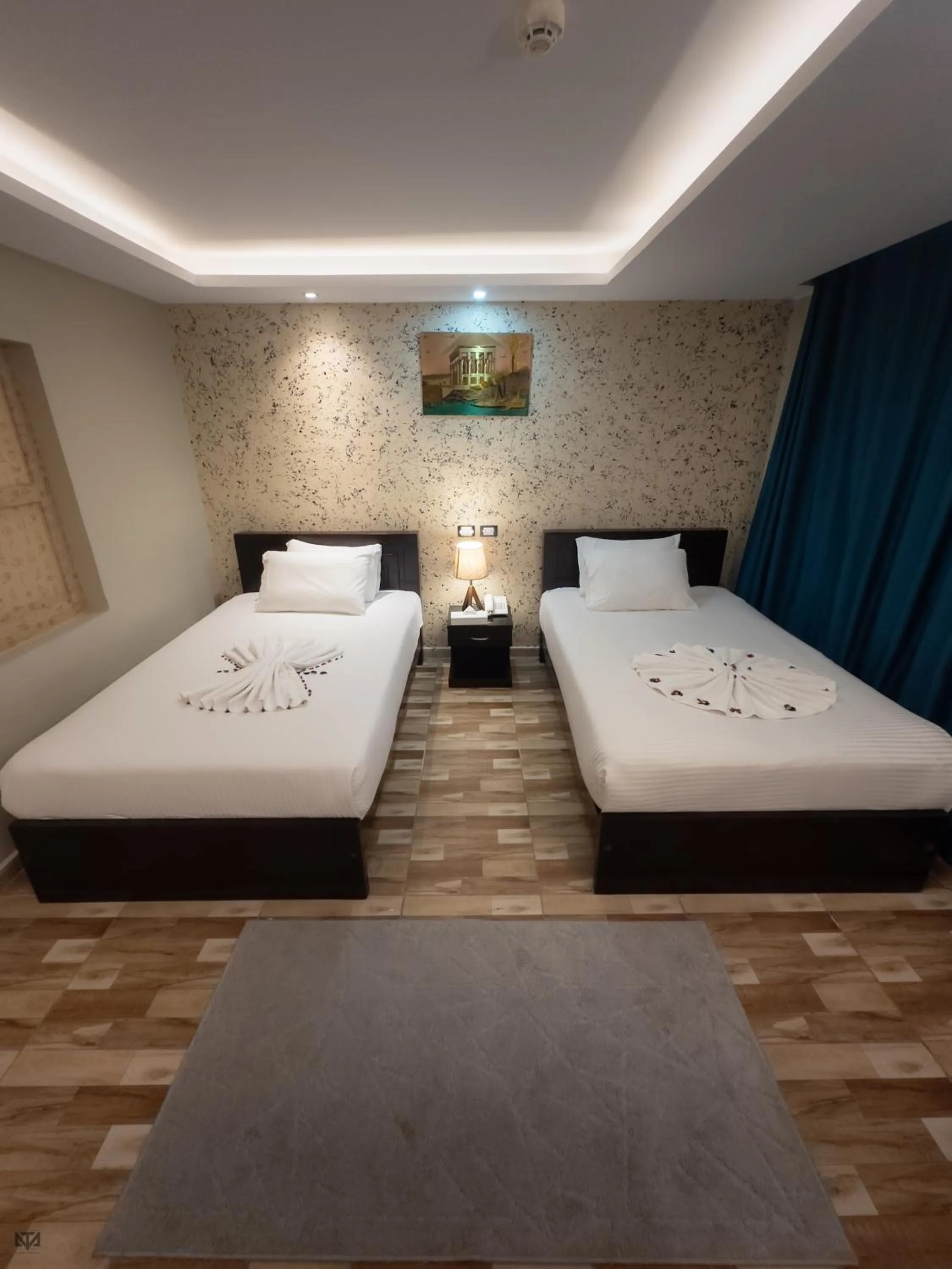 Bed in Turquoise Pyramids & Grand Egyptian museum view Hotel