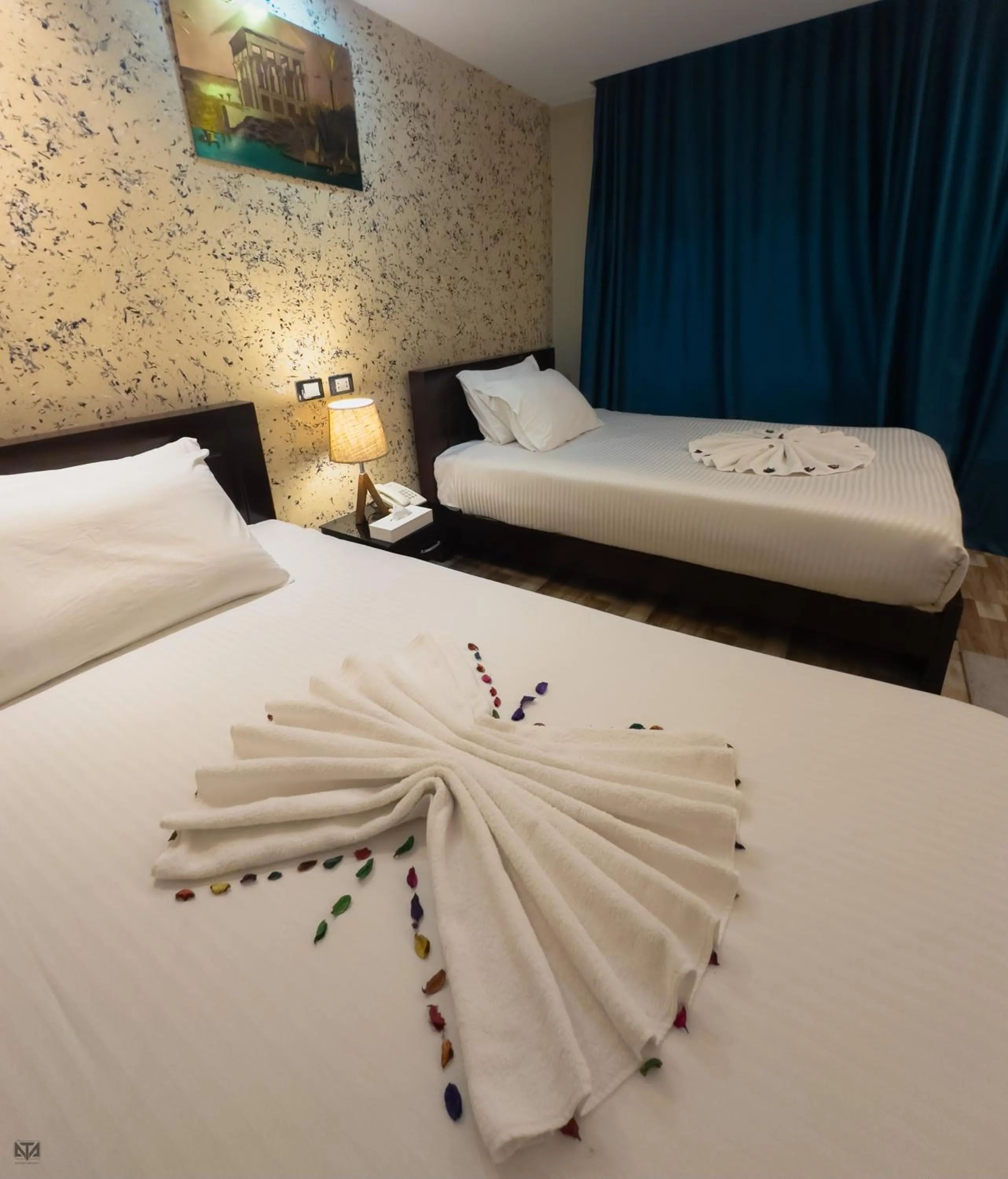 Bed in Turquoise Pyramids & Grand Egyptian museum view Hotel