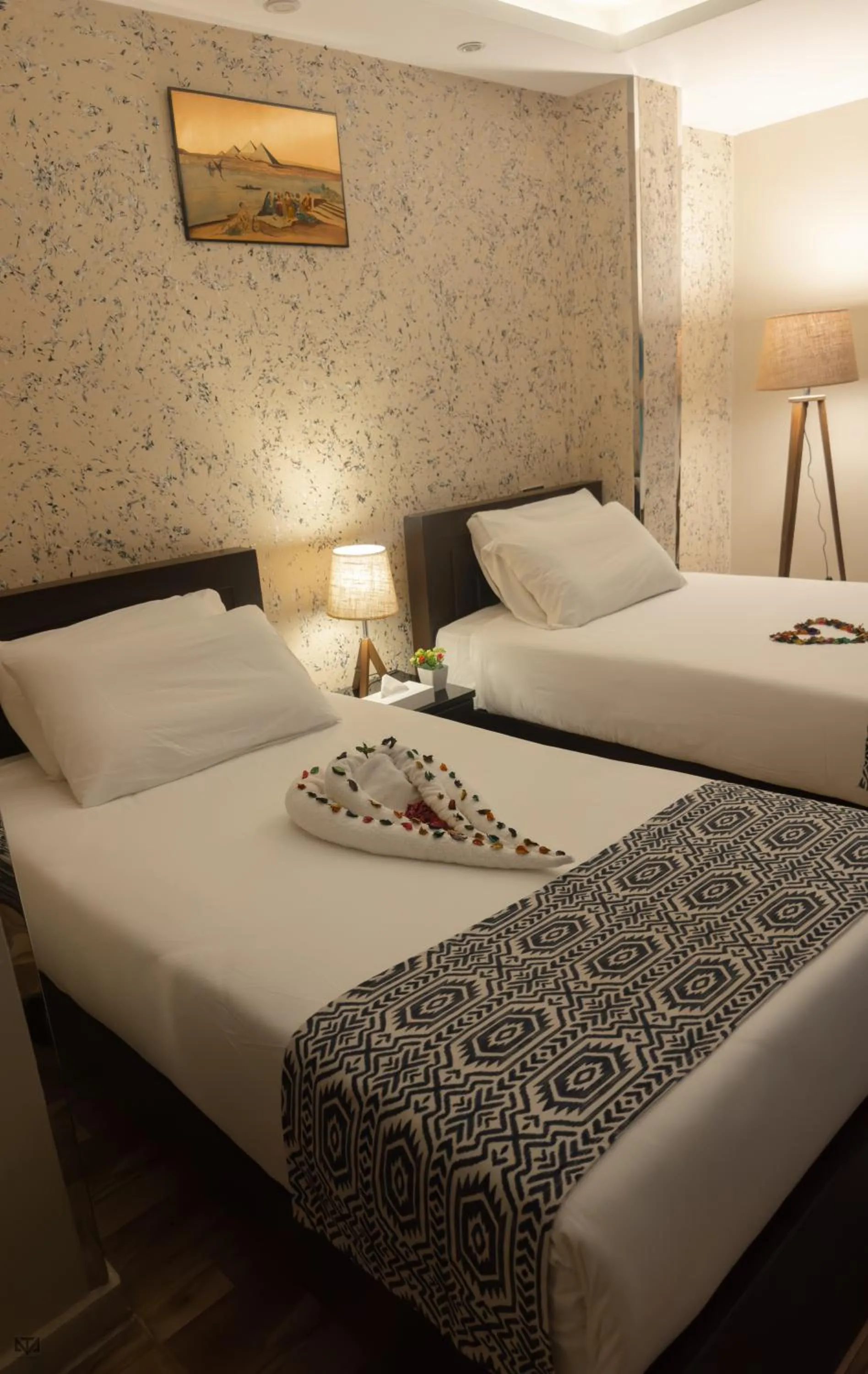 Bed in Turquoise Pyramids & Grand Egyptian museum view Hotel