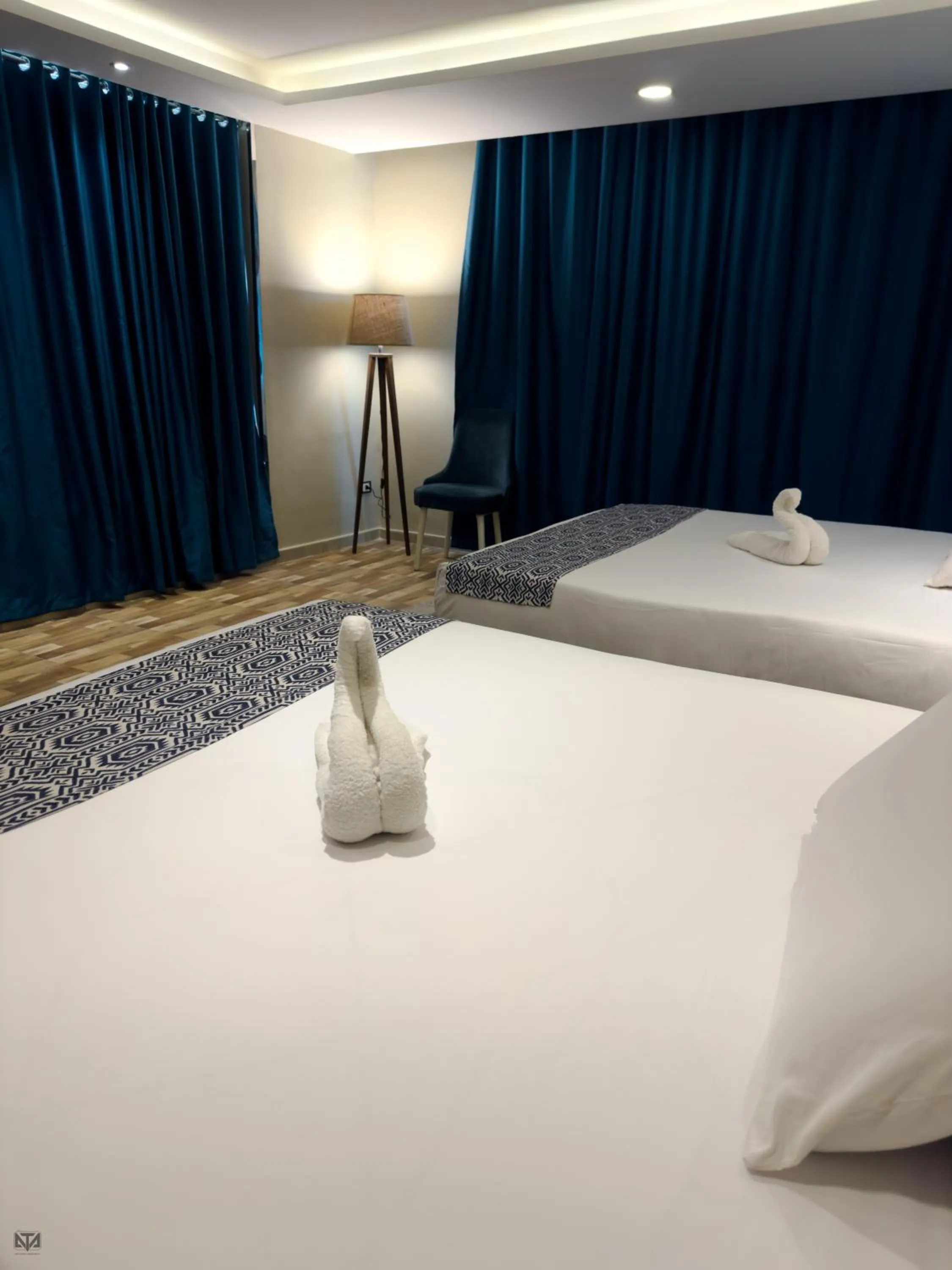 Bed in Turquoise Pyramids & Grand Egyptian museum view Hotel